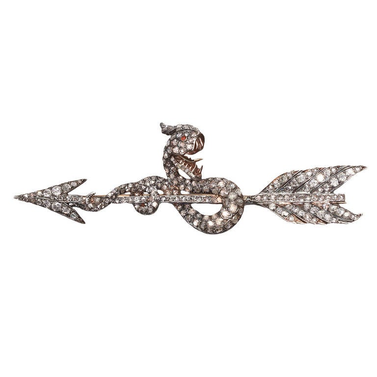 A Late 19th Century Ruby Diamond Silver Gold Snake and Arrow Brooch For Sale