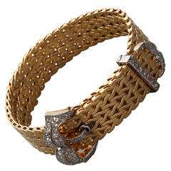A Mid-20th Century Diamond Yellow and White Gold Buckle Bracelet