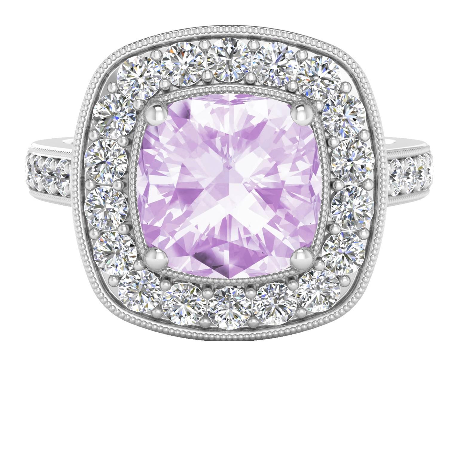 Pink amethyst is the 'it' gemstone of the moment, and this cushion cut diamond halo ring is nothing short of stunning. Beautiful, feminine and unusual all at once, this ring makes a wonderful gift for any woman. With the delicate hues of the pale