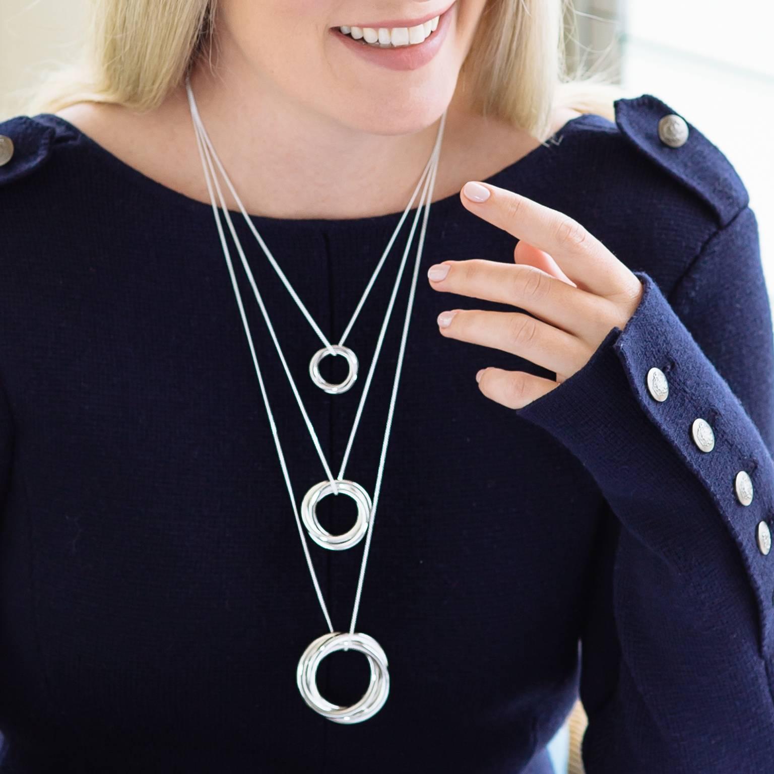 This russian ring necklace, titled the 'Alexandra' is one of our bestsellers, and is worn by celebrities and royalty alike. This trinity of interconnected rings represents family, unity and a bond that cannot be broken. Unique, and unique to you