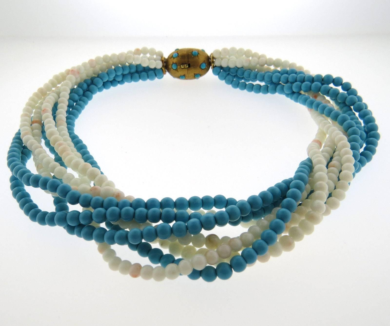 Beautiful 1960s angel skin coral and turquoise beaded multi-strand torsade necklace.  Lovely genuine gemstone turquoise beads measuring 4.8mm - 5.2mm and angel skin coral beads measuring 4.5mm - 5.35mm set with a gorgeous 18k gold (tested) turquoise