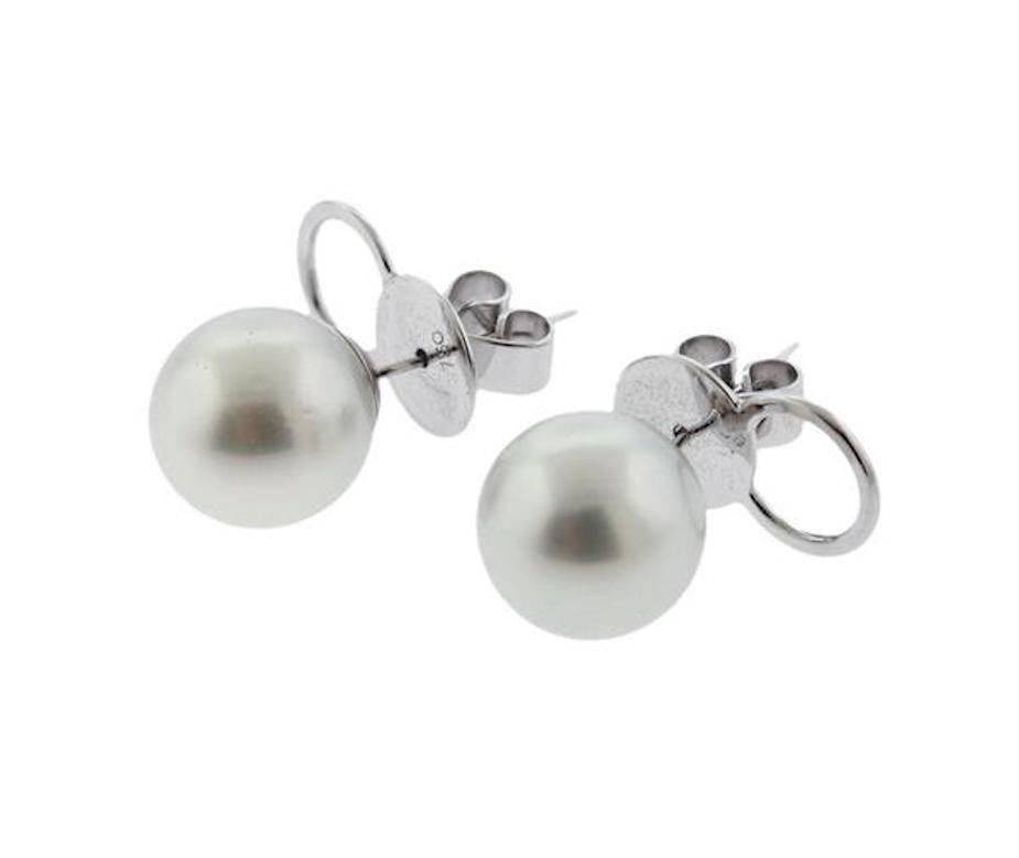 Beautiful Large 1950s/1960s 10mm Cultured Pearl Stud Earrings set in 18k Gold

These striking cultured pearls measure 10.5-10.7mm, quite a nice noticeable size.

Lovely for wearing with a cocktail dress, black tie, wedding or just jeans and a top!
