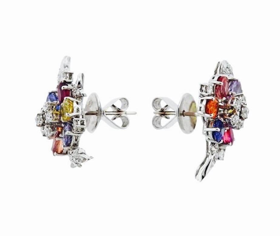 Beautiful cluster earrings composed of semi-precious colored gemstones, and 0.50 carats of beautiful brilliant diamonds.  The earrings are set in 18 gold (marked 750 D72 and tested) and measure 25mm X 16mm.  They have a weight of 8.6 grams. 

