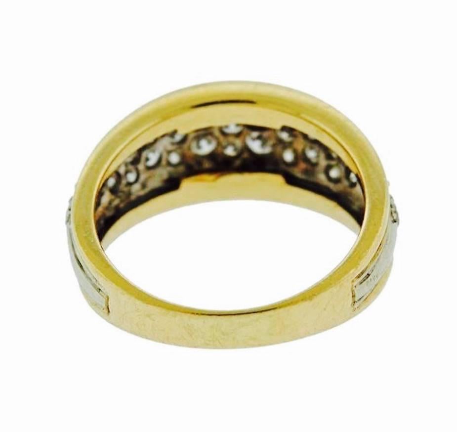 Beautiful 14k gold anniversary band is set with 33 diamonds totalling approximately 0.85 carats of brilliant cut white pave diamonds.  The ring size is 9.5 mm at the widest point and currently sized at an 8.5, but can be resized.  The weight of the