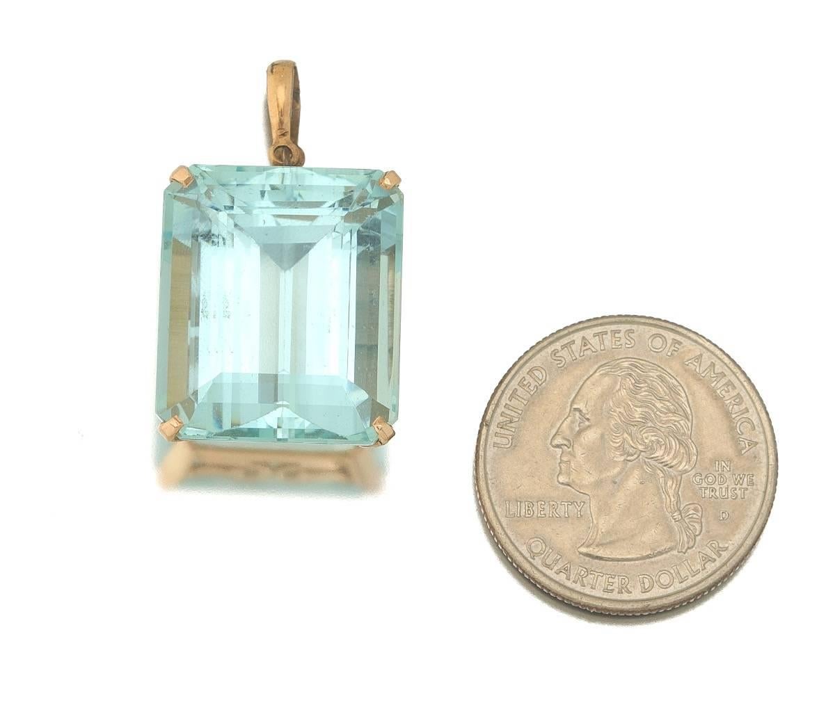 Stunning Art Deco period aquamarine pendant is quite rare in this 39 carat size given the exceptionally high quality, natural color and VS clarity condition.  The aquamarine is set in a simple 14k yellow frame but could easily be remade into a