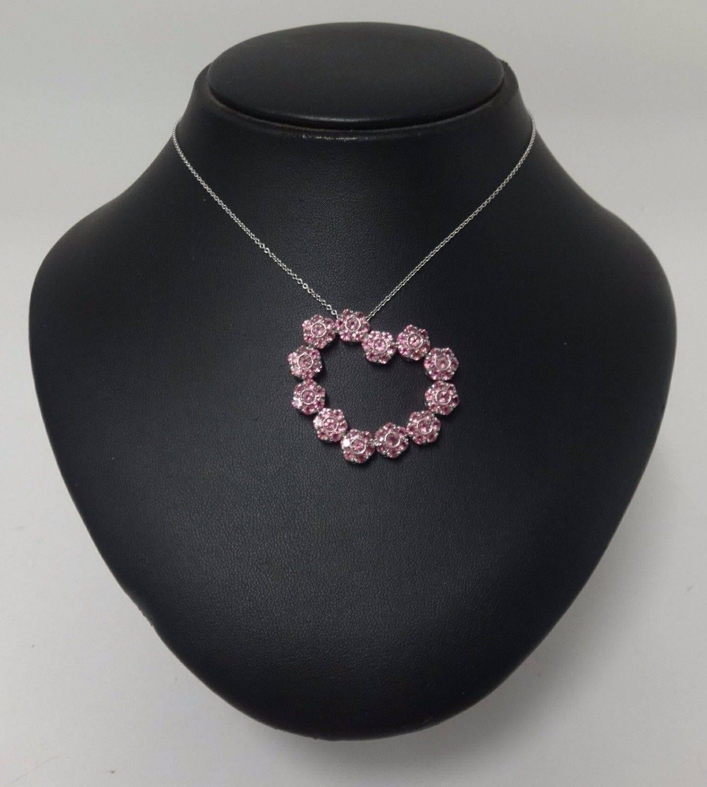 Totally amazing Pasquale Bruni 18 ct white gold and sapphire heart pendant.  The pendant is made of a series of little flowers which are all pink sapphires.  The weight is just over 17 grms.  This is a stunning pendant that would make a lovely gift