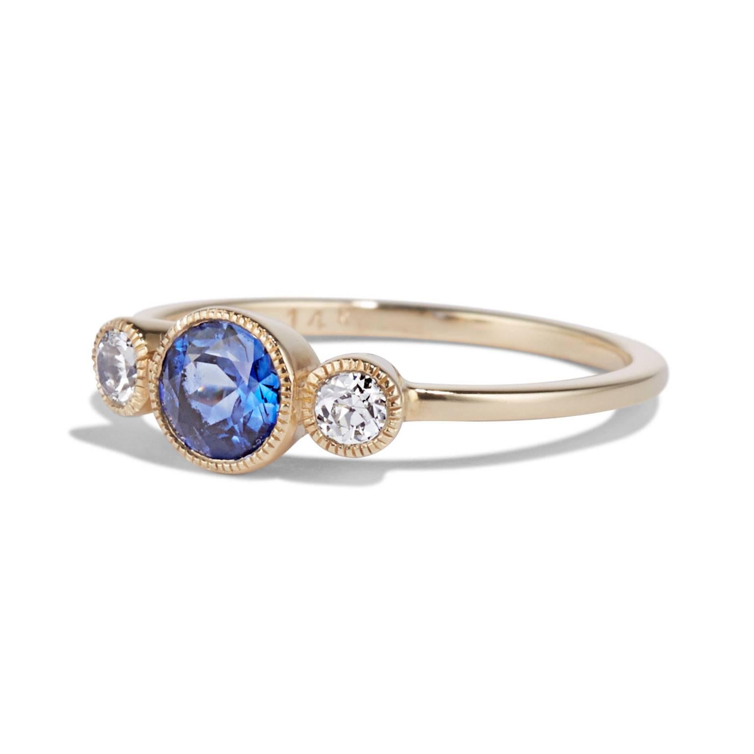 The juxtaposition of a luminous 0.73-carat sapphire alongside brilliant cut old mine diamonds creates a strikingly pretty style in the Sapphire Circles ring from Cushla Whiting's Petite Colours range.

The SAPPHIRE CIRCLE ring is made in 14 carat
