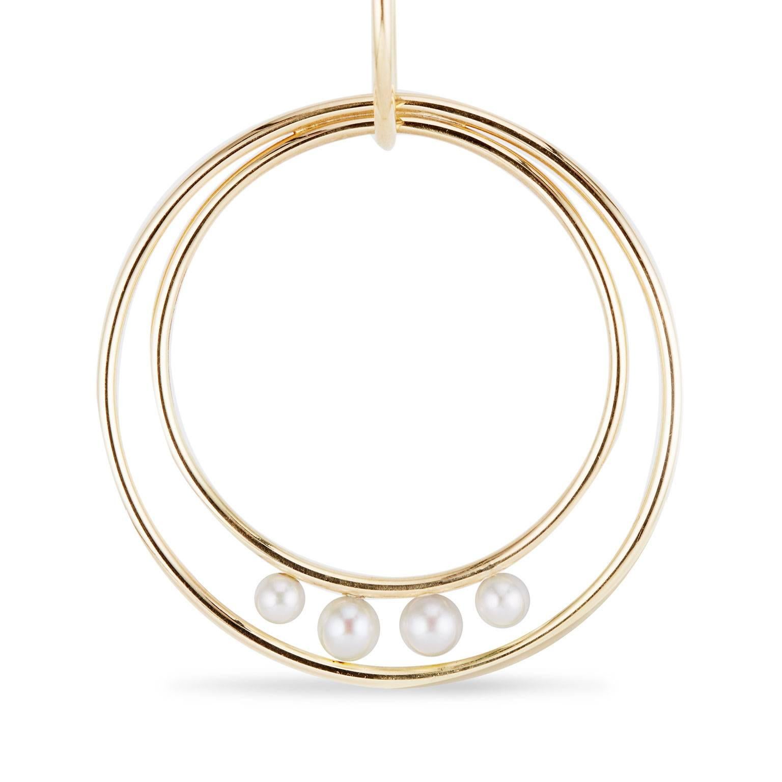 The classic elegance of pearls fused with the striking forwardness of interlinked 18-carat gold hoops. Not your grandmother’s pearls. The PLANETARY PEARL HOOPS earrings from Cushla Whiting's Celestial Collection are made in 18 carat gold with small