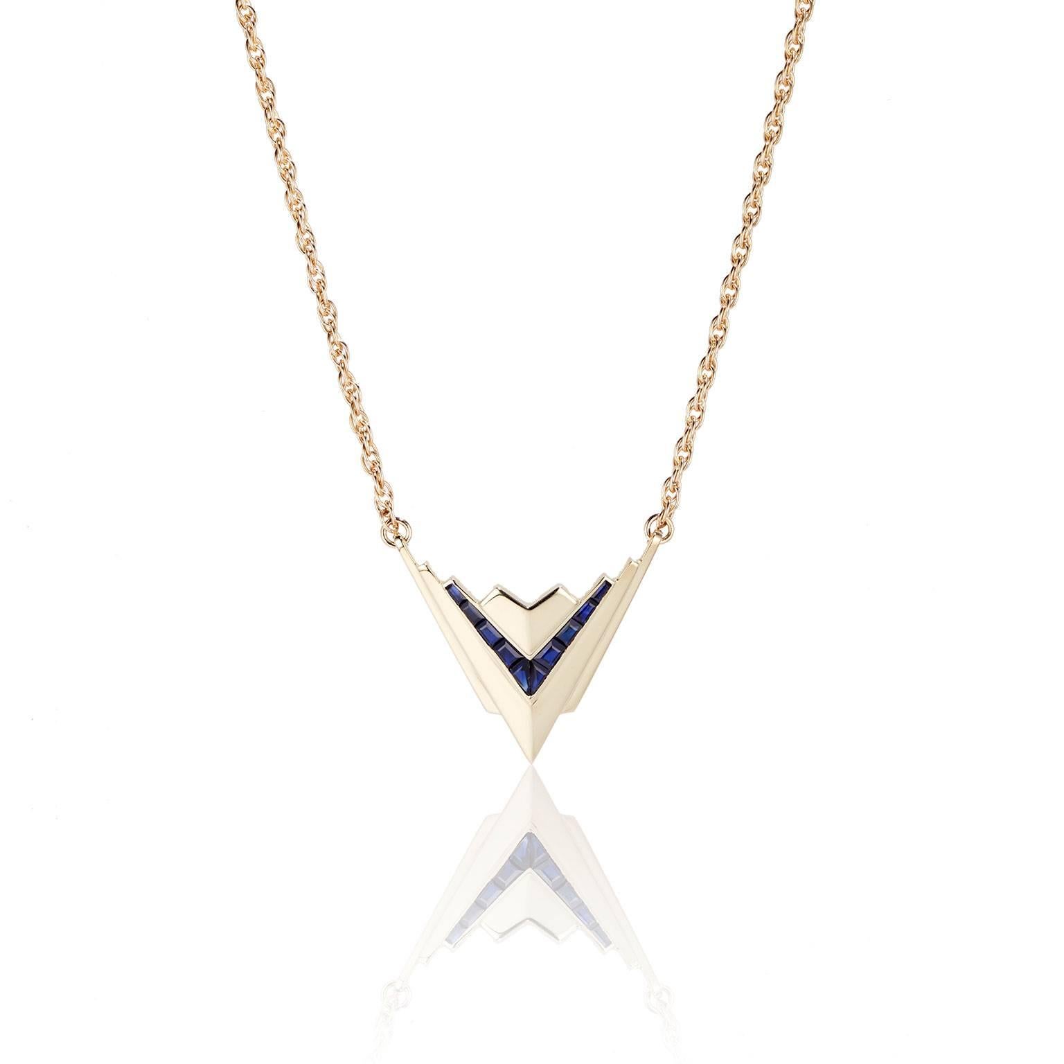 The Metropolis pendant combines blue/black sapphires with 18-karat gold to create a glamorous yet subtle necklace that sits at matinee length beneath the collarbone. Handcrafted in Melbourne, Australia. 

Italian made 18 karat gold chain,