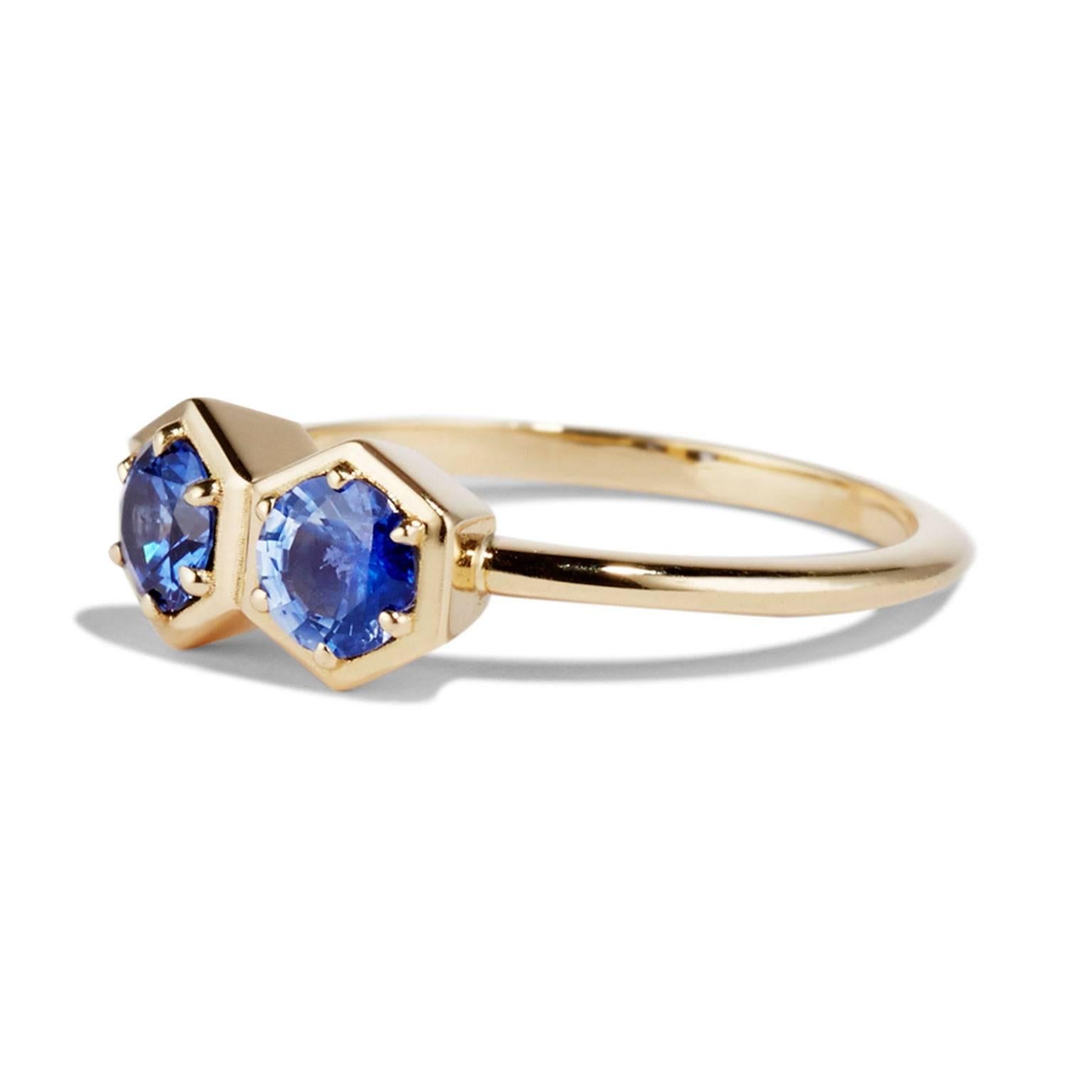 A pair of sapphires sparkle when cut in an interesting way and placed alongside each other to create a mirror effect. The DOUBLE HEX ring is made in 18 carat gold holding a pair of sapphires.

All of our designs can be modified to meet a range of
