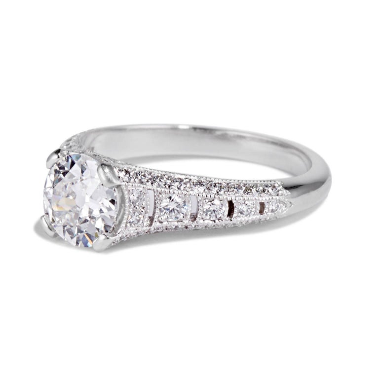 The Esther Ring is a sculptural take on a vintage engagement ring. It stars and incredible 1.11 carat old European Cut diamond surrounded by smaller stones along the band so that the finger appears bathed in diamonds.

With delicate cut outs on the