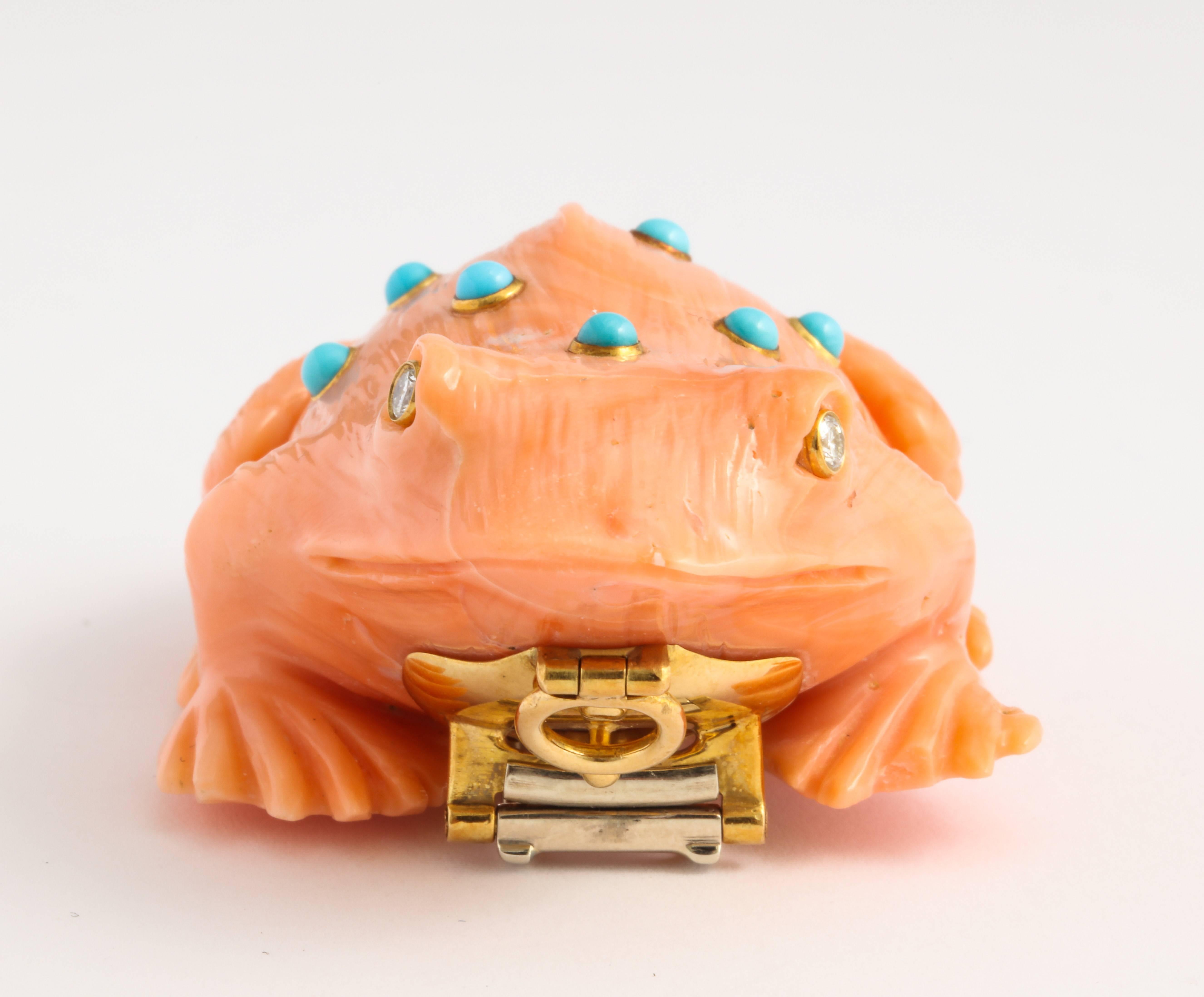 David Webb Carved Coral Frog Brooch

Set with diamond eyes and turquoise

Signed Webb