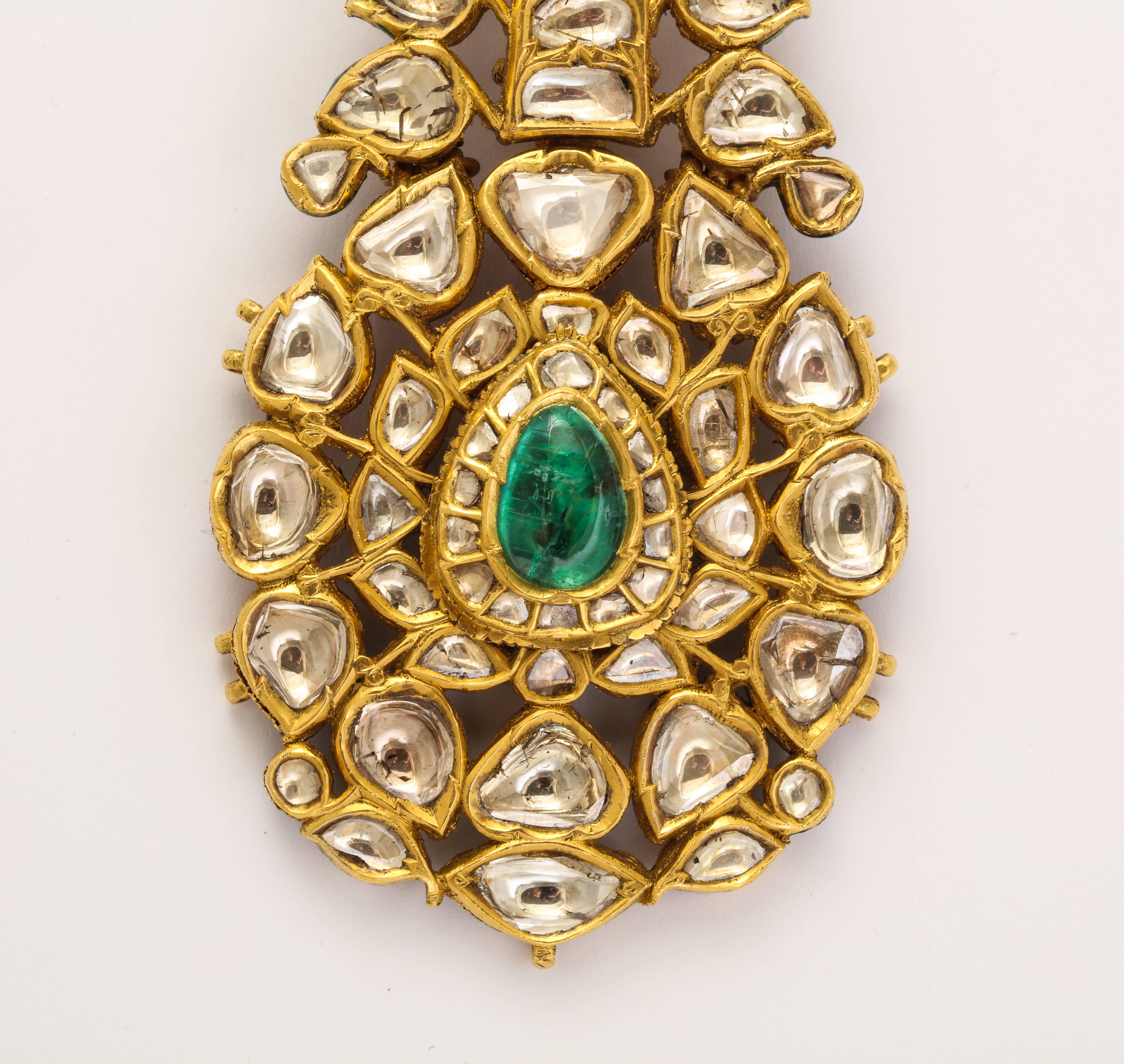 A very rare rose cut diamond, cabochon emerald enamel on 22 karat gold Sarpech/turban ornament,

Can be used as a brooch or a pendant

Depicted in full page spread in the 
