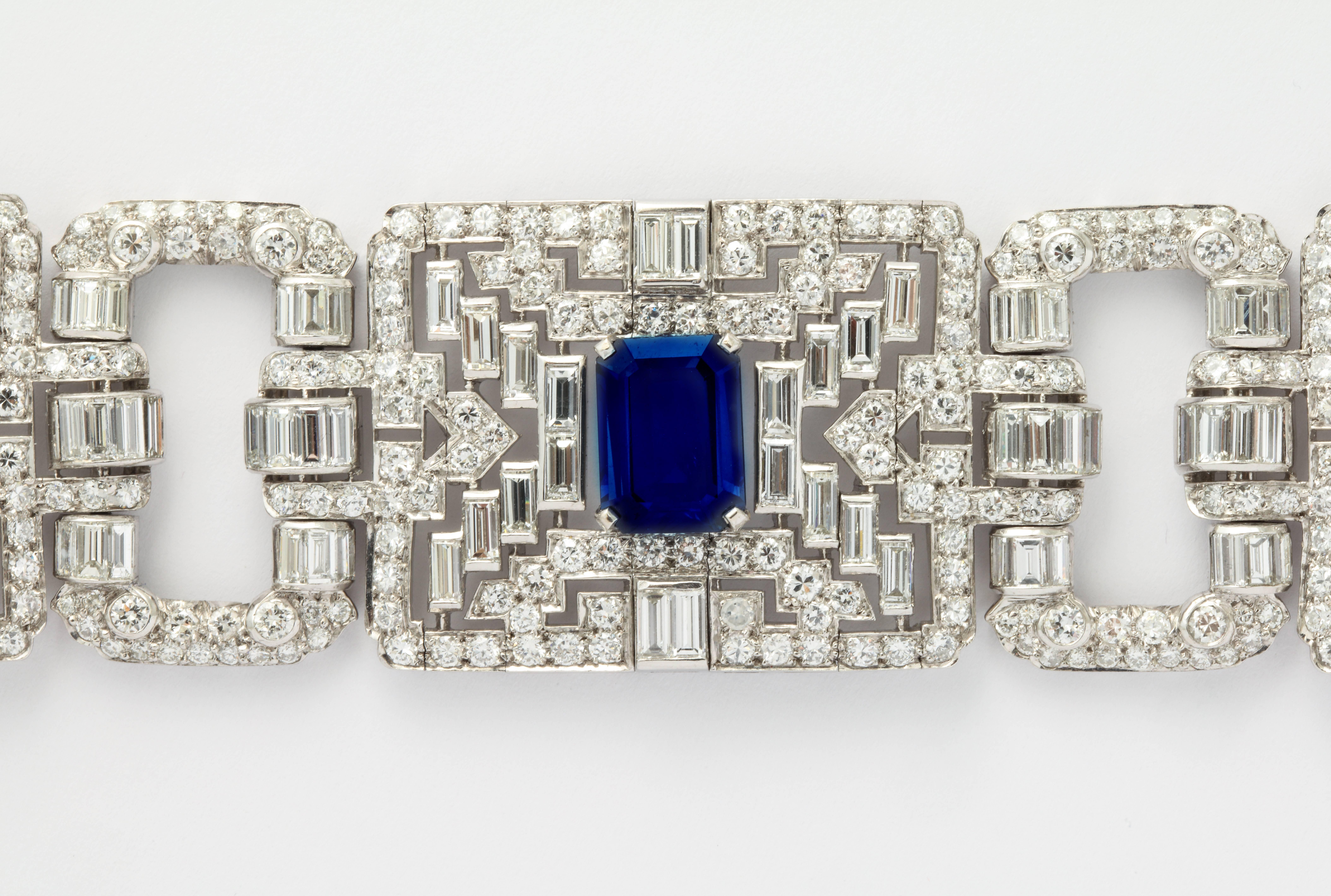 A very impressive Wide Art Deco Diamond and Sapphire Bracelet

The largest sapphire weighs approx 6.01 ct
The other two sapphires weigh approx 7.57 ct
Diamond weight is approx 31.48 ct

All three sapphires are GIA certified

1.22 inches