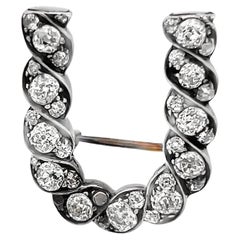 Broche victorienne en forme de fer à cheval en diamants d'ancienne mine