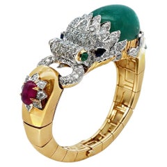 Bracciale rigido "Chimera" con smeraldi e diamanti di David Webb