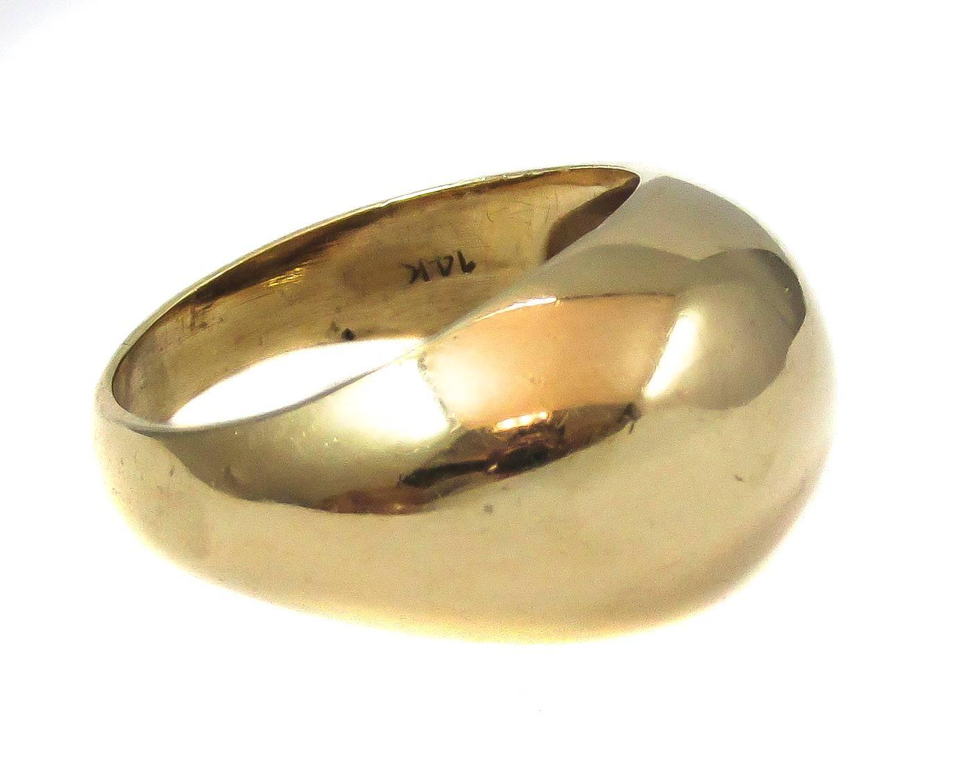 Chic Tiffany & Co dome ring crafted with 14 karat yellow gold that is smoothed and polished to give it an everlasting shine. 

-	Size 7.5
-	Stamped Tiffany & Co., 14K
-	7.9 grams
-	5.1 dwt
