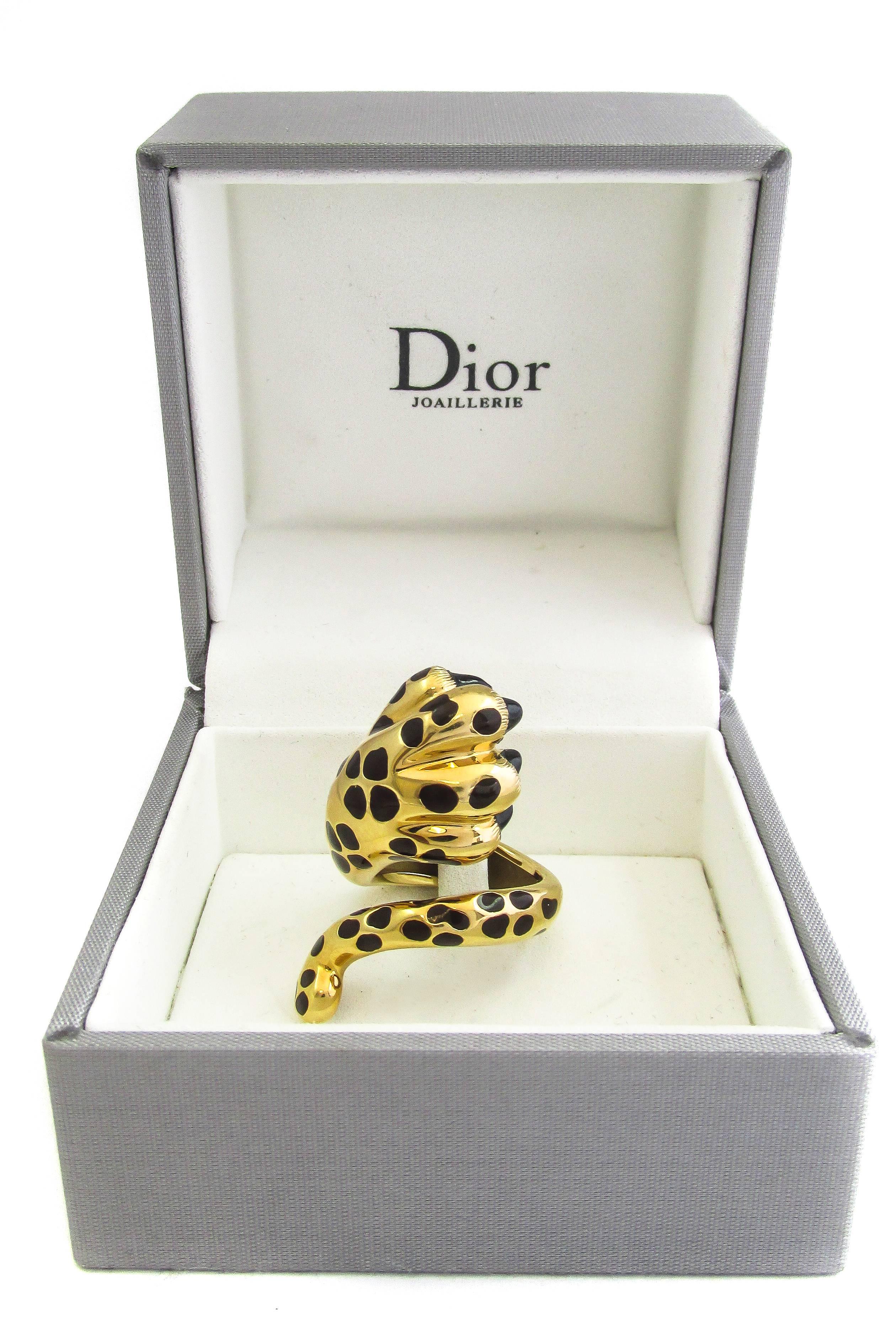 Bold Dior 18 karat yellow gold and black lacquered “Mitza” ring will claw its way into any fashionistas heart. This fun and extravagant ring comes in its original box and a certificate of authenticity by Dior.

- Size 5.5
- Stamped 51 Dior