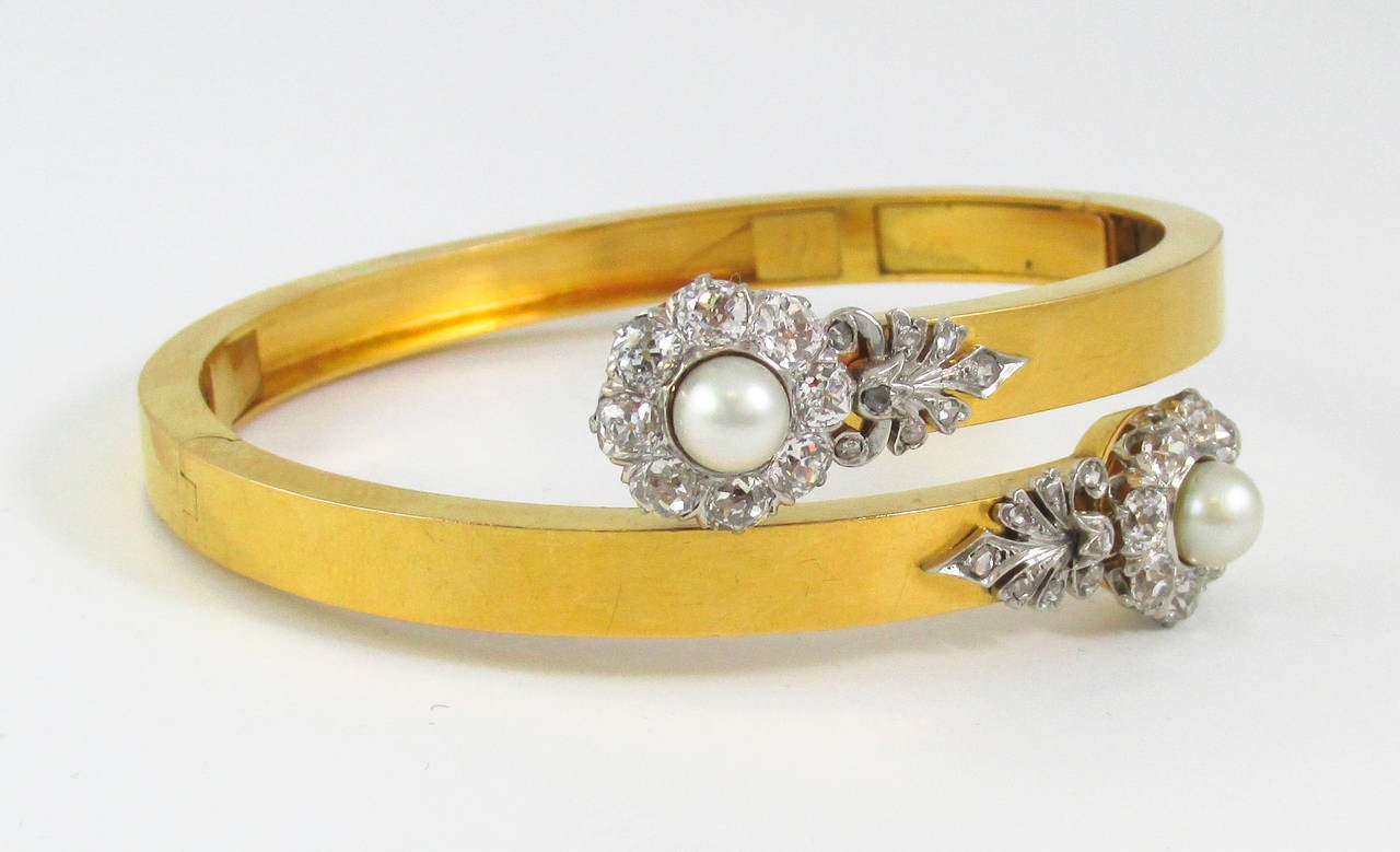 Antique Natural Pearl Diamond Gold Platinum Crossover Bangle Bracelet In Excellent Condition In New York, NY