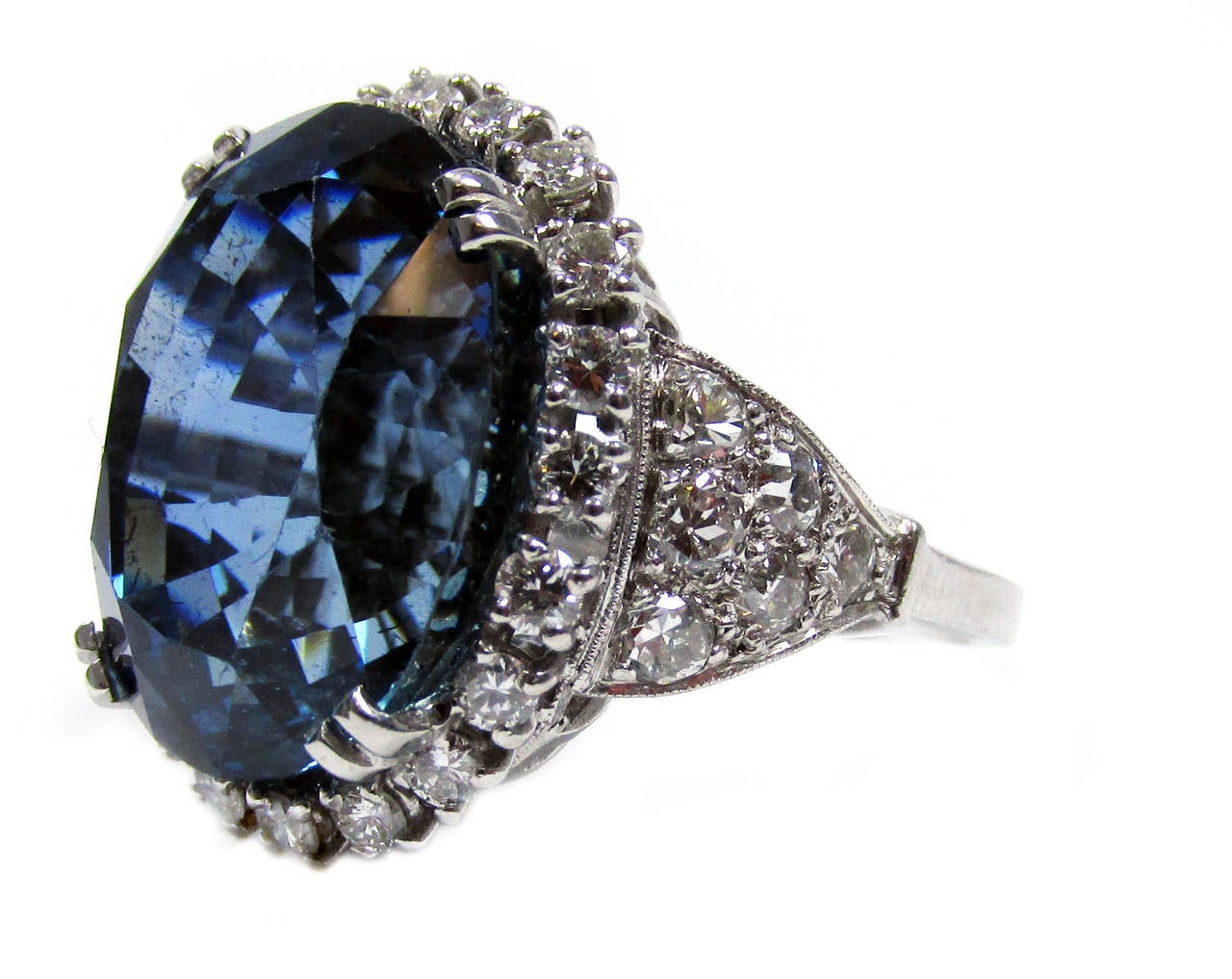 22.12 ct Burma sapphire platinum diamond vintage ring, AGL cetified, no heat treatment or enhancement,  further set with 32 round brilliant cut diamonds weighing approx. 2 cts total, size 6, sizable