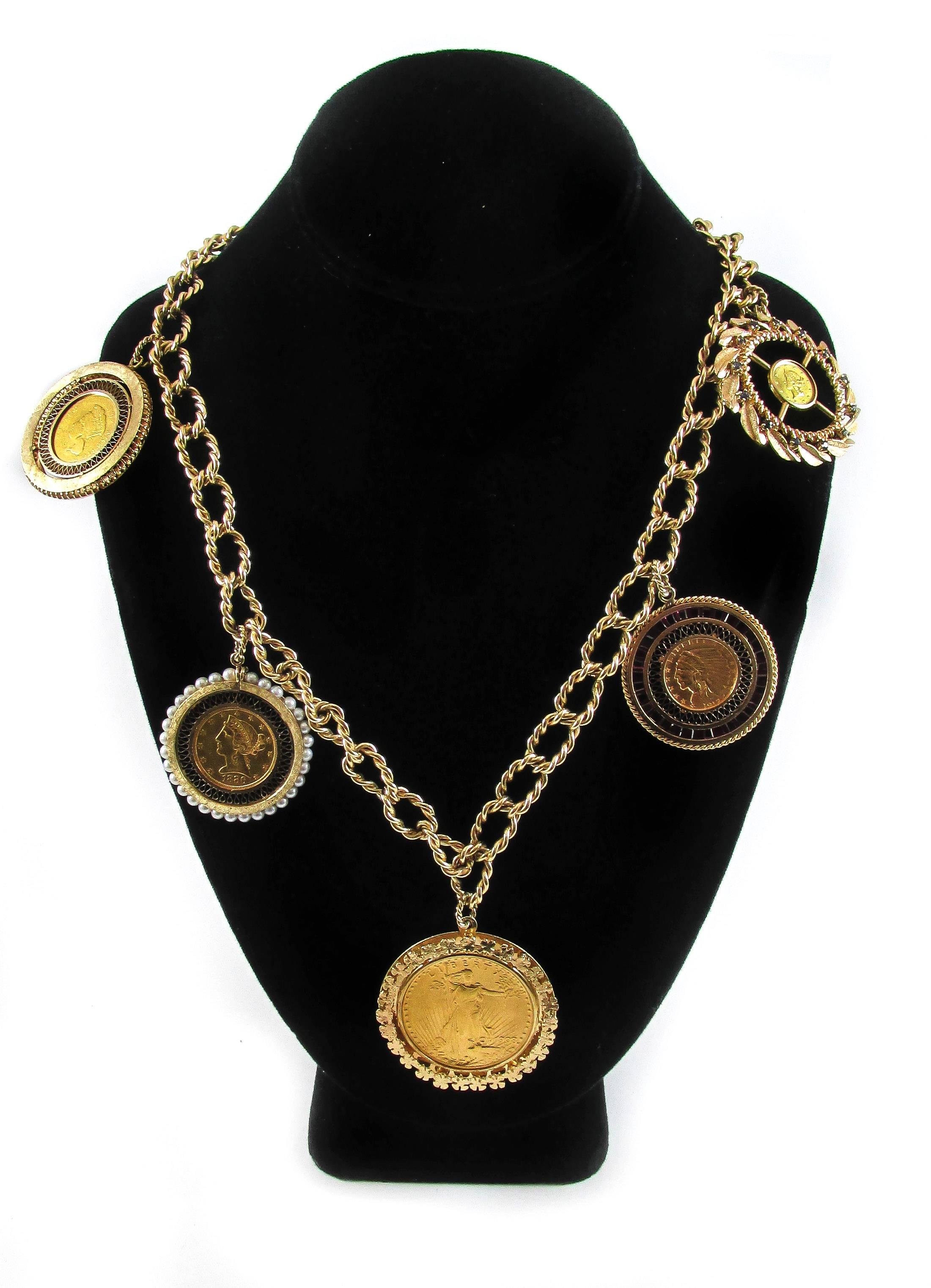 Gorgeous 14 karat yellow gold chain necklace with five (5)  22 ct. gold coins:
- $20 1908 Liberty gold coin surrounded in 4 leaf clover motif with a diameter of 1.75 inches.   
- $2.5 1912 Indian head gold coin surrounded by 33 synthetic rubies