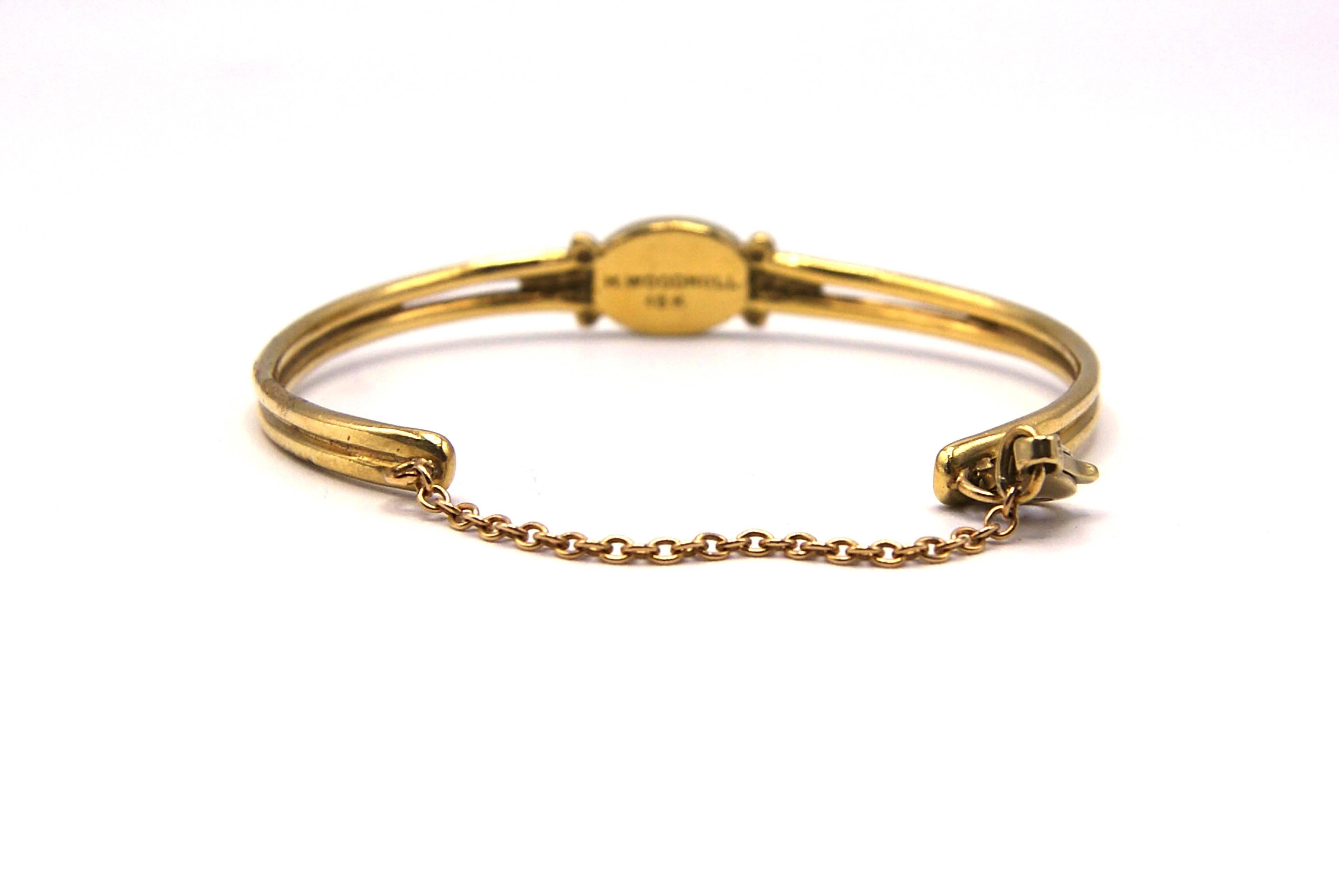 H. Woodhull 1990s Egyptian Revival Yellow Gold Bangle Bracelet In Excellent Condition In New York, NY