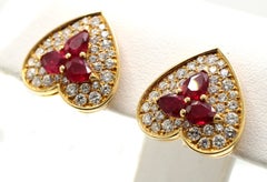 Marchak Paris: orecchini a clip in oro giallo 18 carati con rubini e diamanti