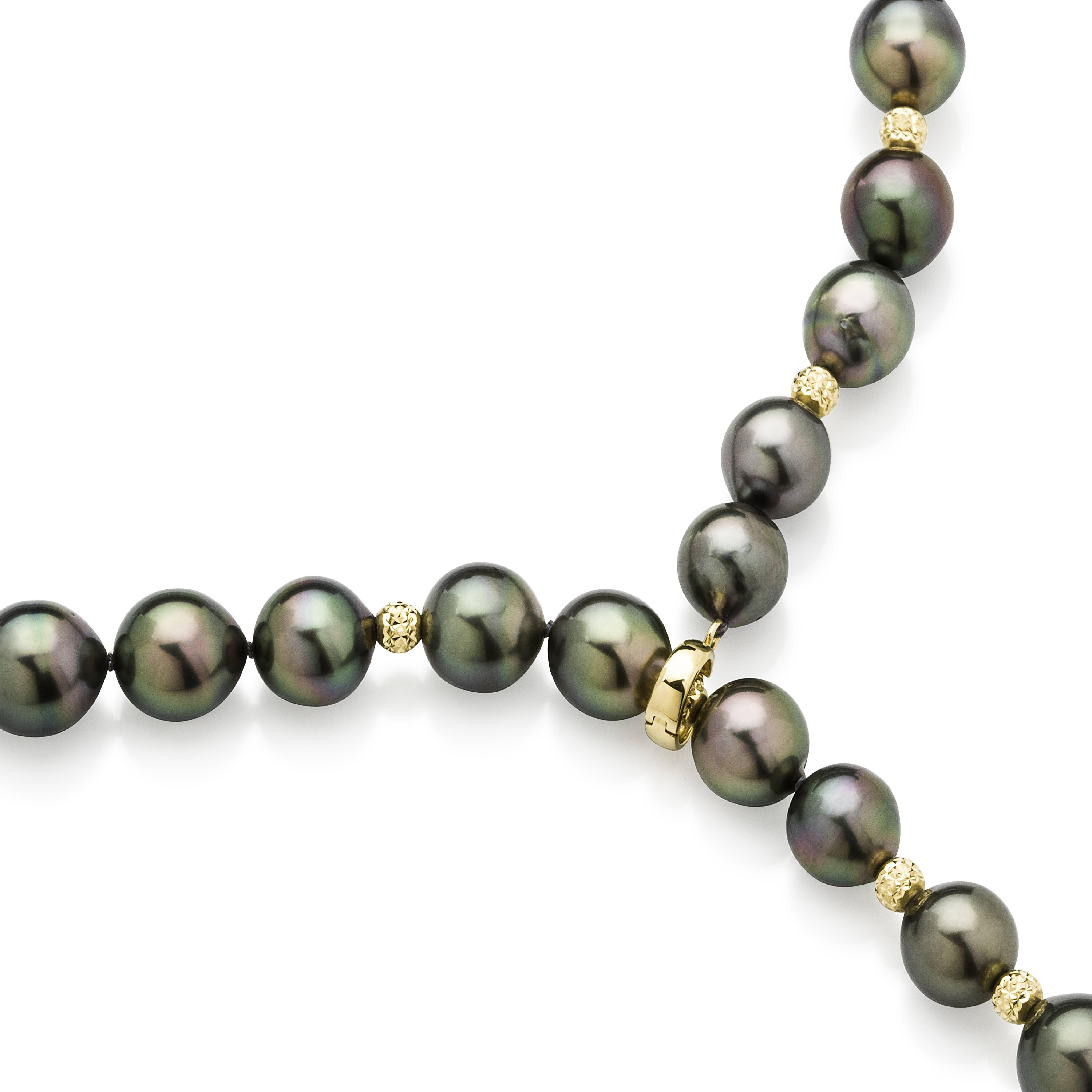 Versatile strand of Tahitian South Sea pearls....

This strand of 44 pearls from 0.35 - 0.45 inches / 9 mm - 11.6 mm is complimented with 7 x 18 carat yellow gold beads as a feature and an 18 carat yellow gold latch clasp.
             
The pearls