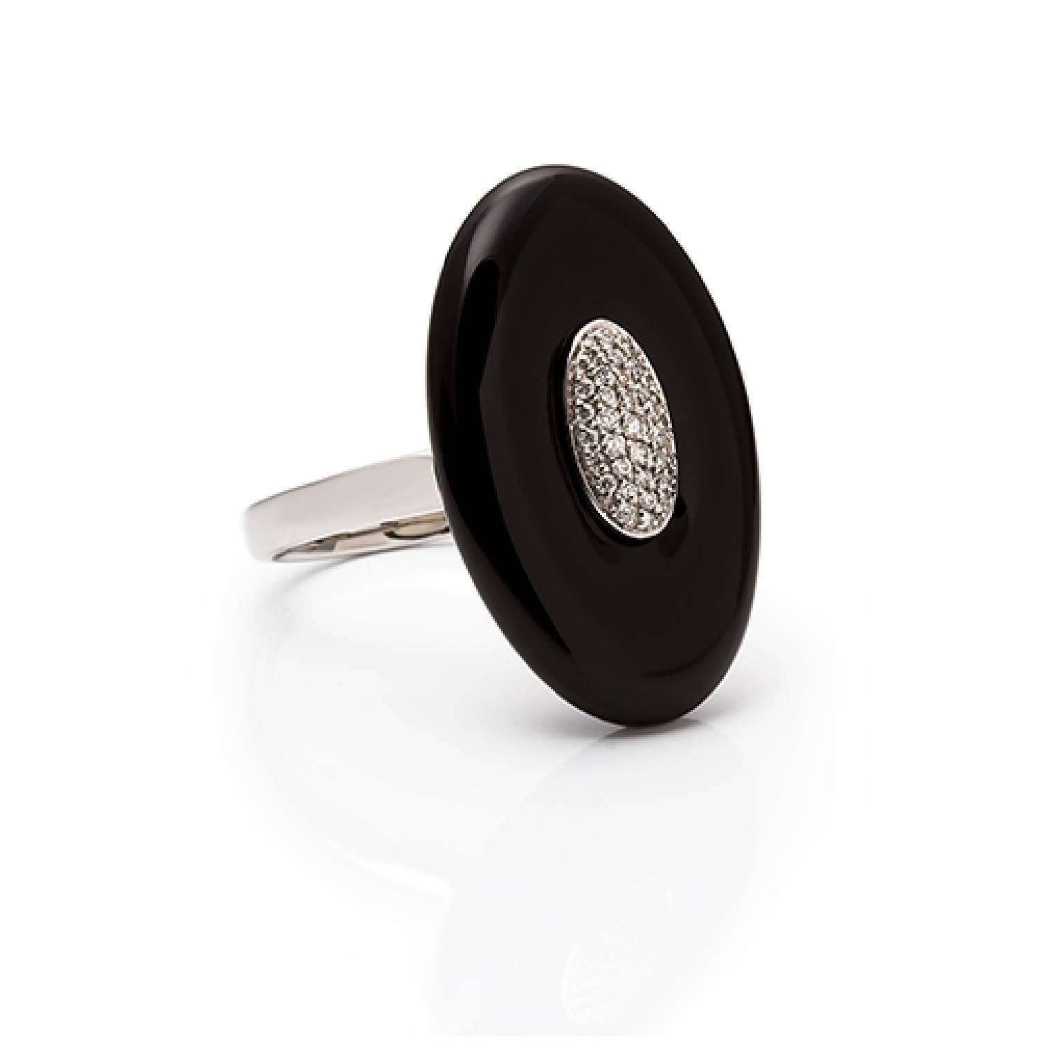 Black and Diamonds..

Contemporary style combined with elegance...

This 18 carat white gold cocktail ring features a stunning Onyx border with 0.18 carat brilliant cut white diamonds which are nestled in the center.

The ring is beautifully
