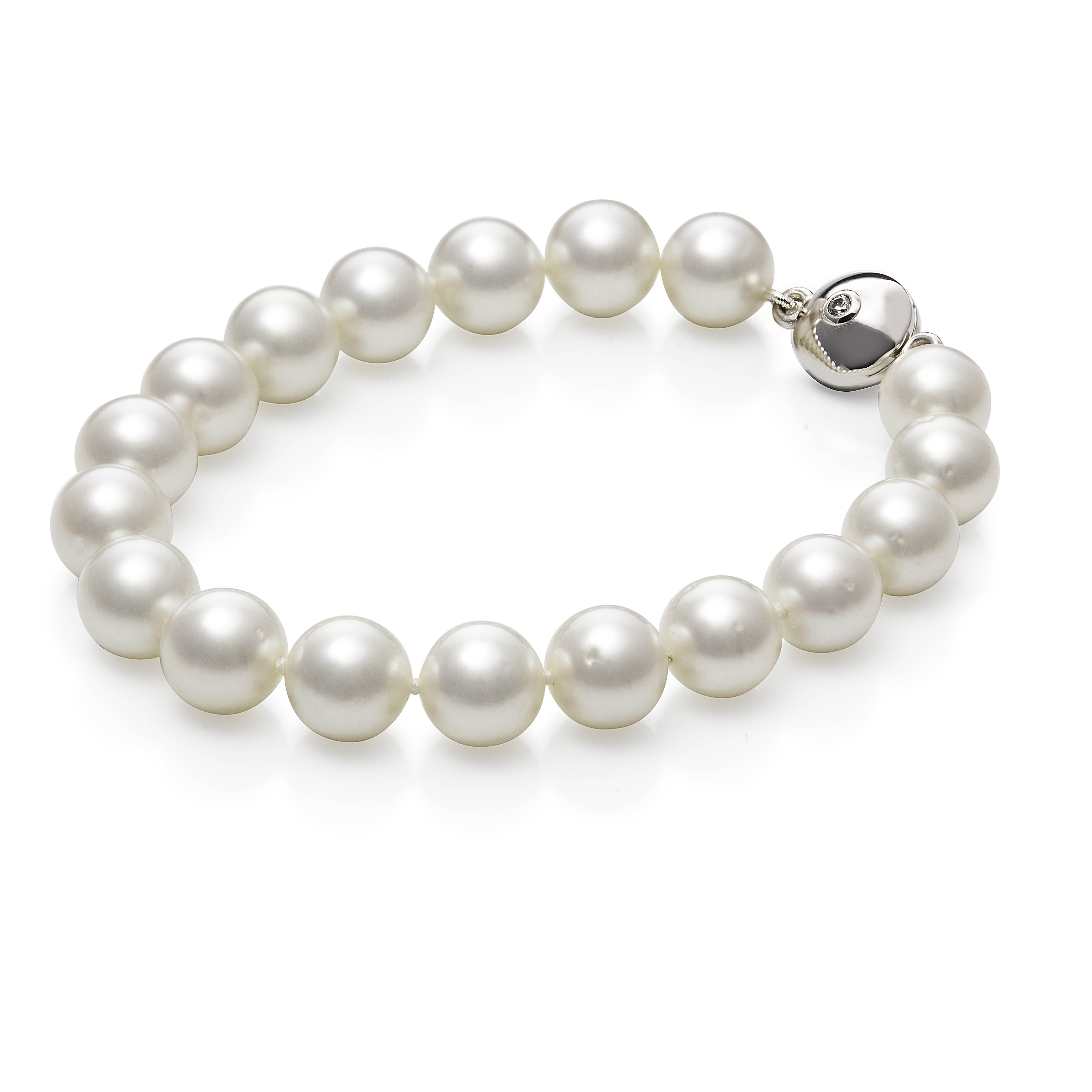Australian South Sea pearl bracelet of 9-10mm near round, white, grade 3 pearls.  (some of the pearls will have fine marks on them which is reflected in the price).  The pearls have a fine nacre which is shown off with the high lustre.  colour is