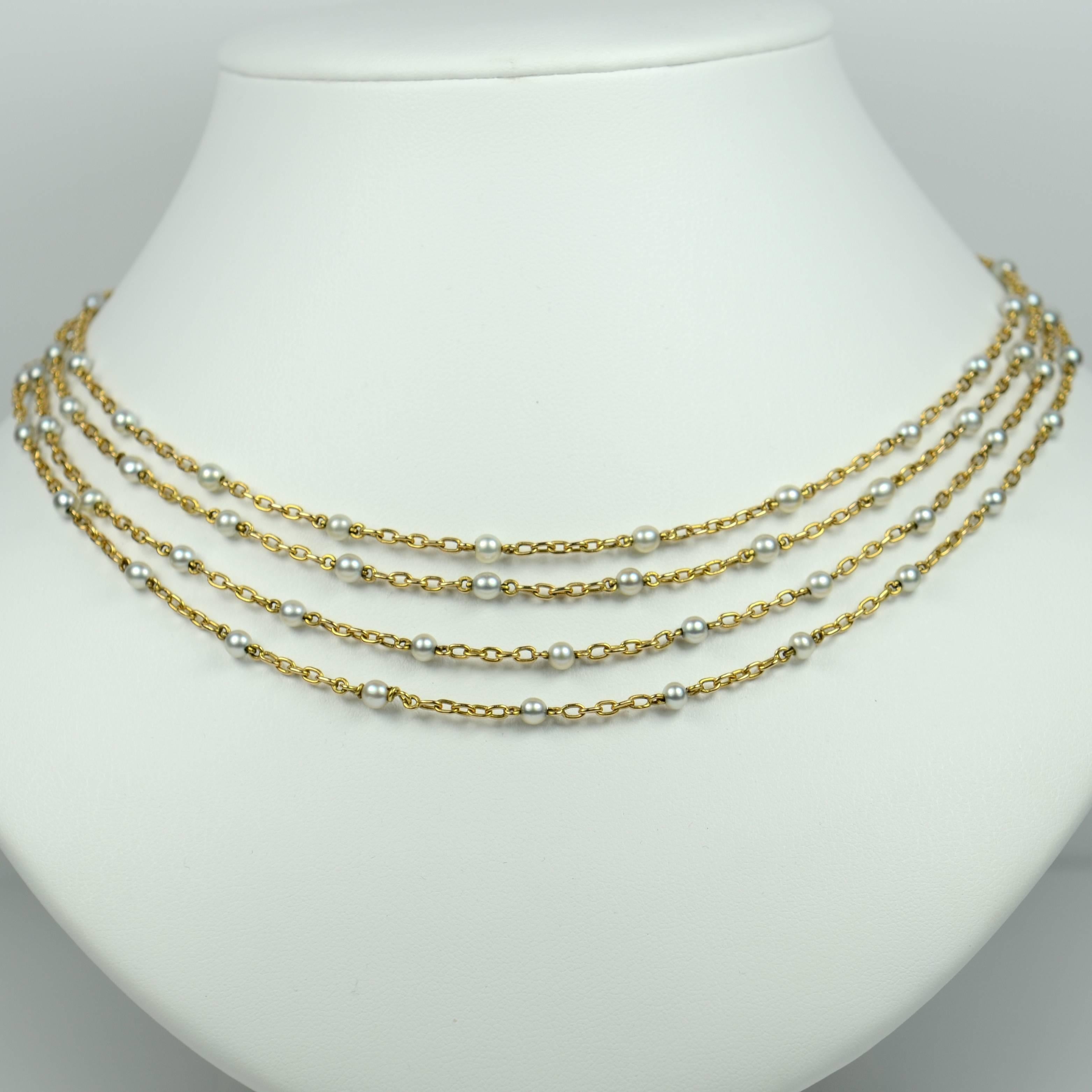 long gold and pearl necklace