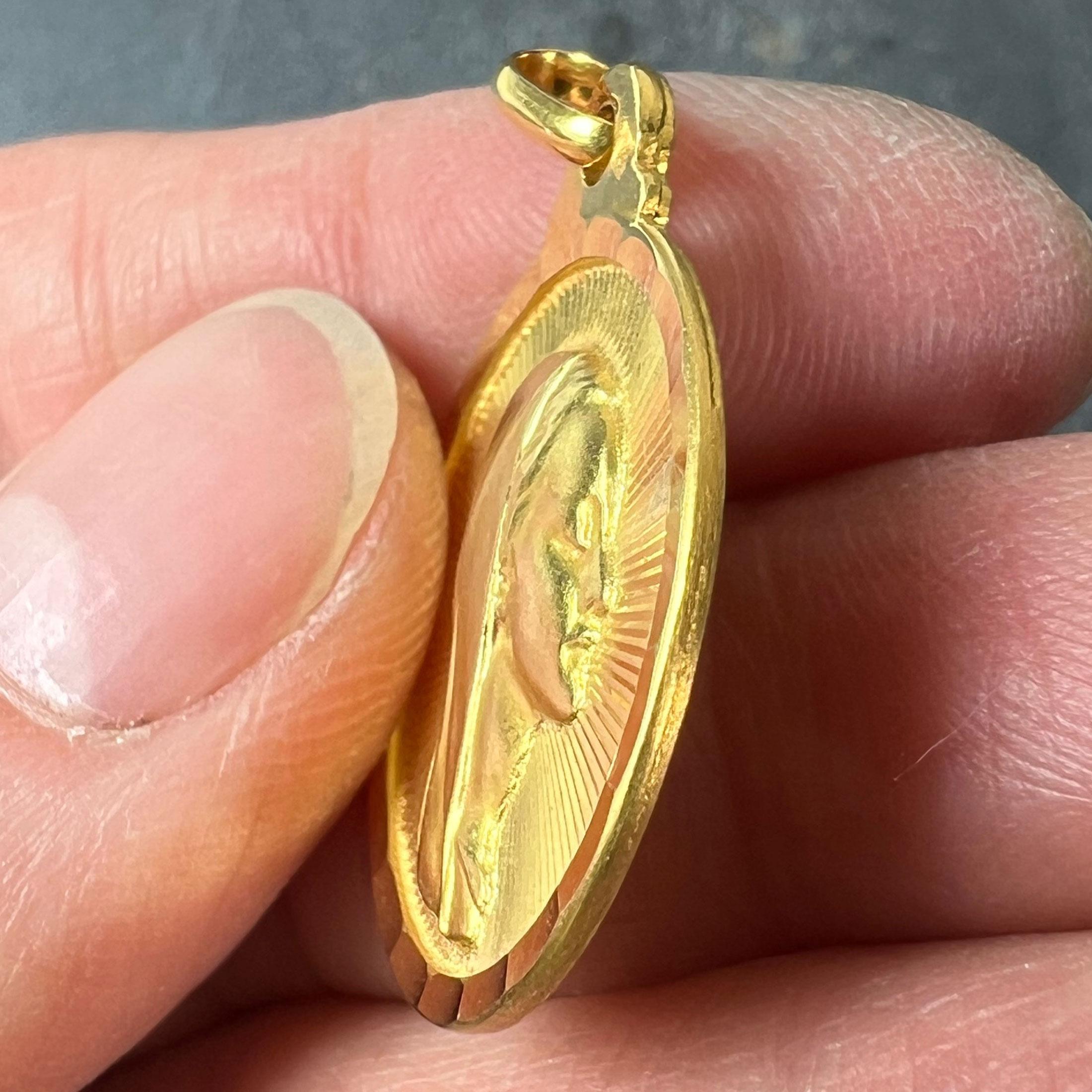 Women's Vintage French Virgin Mary 18K Yellow Gold Sunburst Medal Pendant For Sale