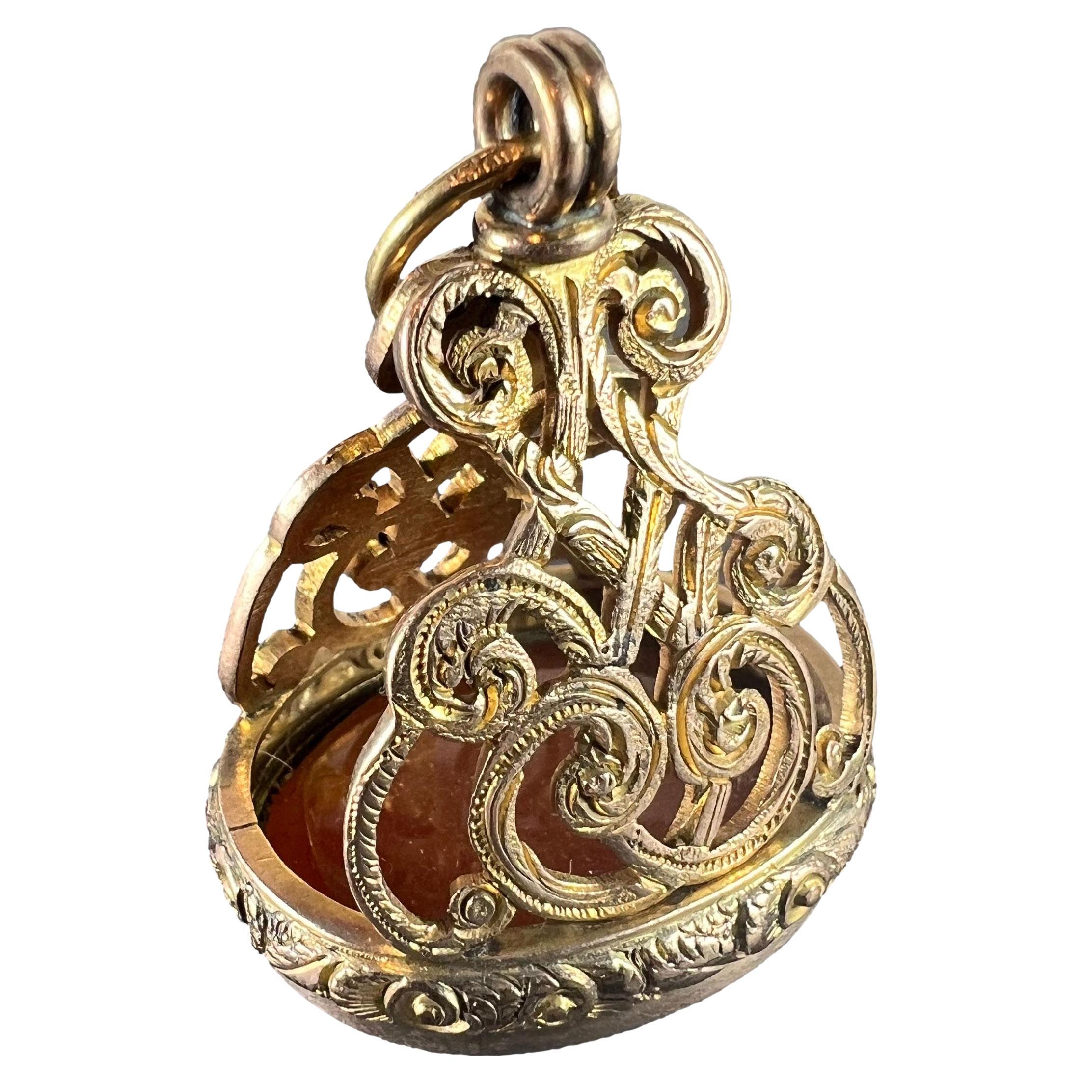 Colgante con dije de cornalina grande de oro amarillo