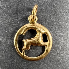 Colgante con dijes de oro de 14 quilates con el símbolo del signo zodiacal de Capricornio (la cabra)