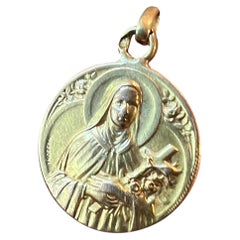 Pendentif religieux français Mazzoni en or jaune 18 carats représentant Sainte Thérèse