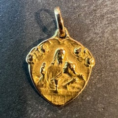 Pendentif antique français en forme de bouclier représentant Jésus-Christ, datant d'une première communion, en or jaune 18 carats