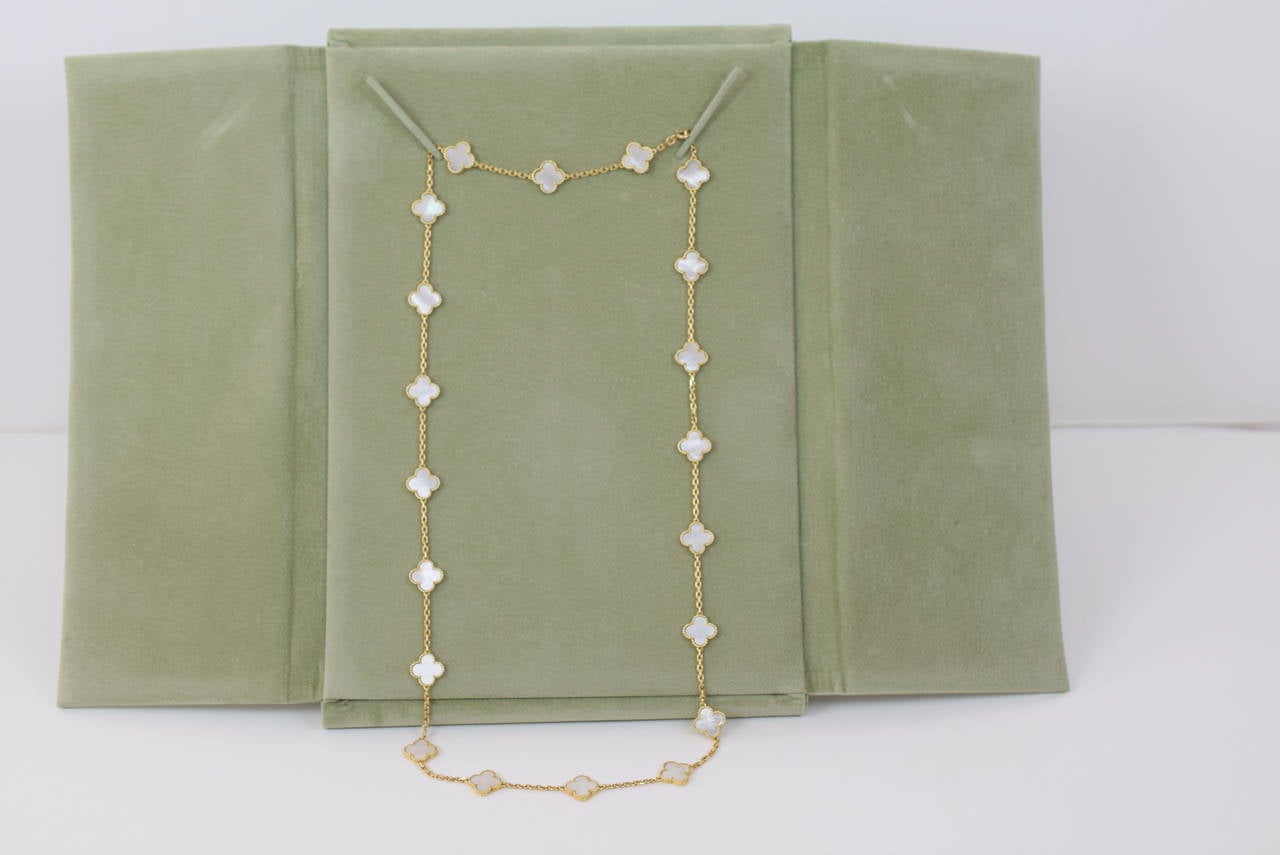 Van Cleef & Arpels Alhambra 18K Yellow Gold Mother-of-Pearl 20 Motif Necklace.

With original Inner and outer box as shown in the photos .

Circa 2007-2010. Serial number B4050M2.
Drop 15 1/2 inches. Looks great as a choker necklace and never