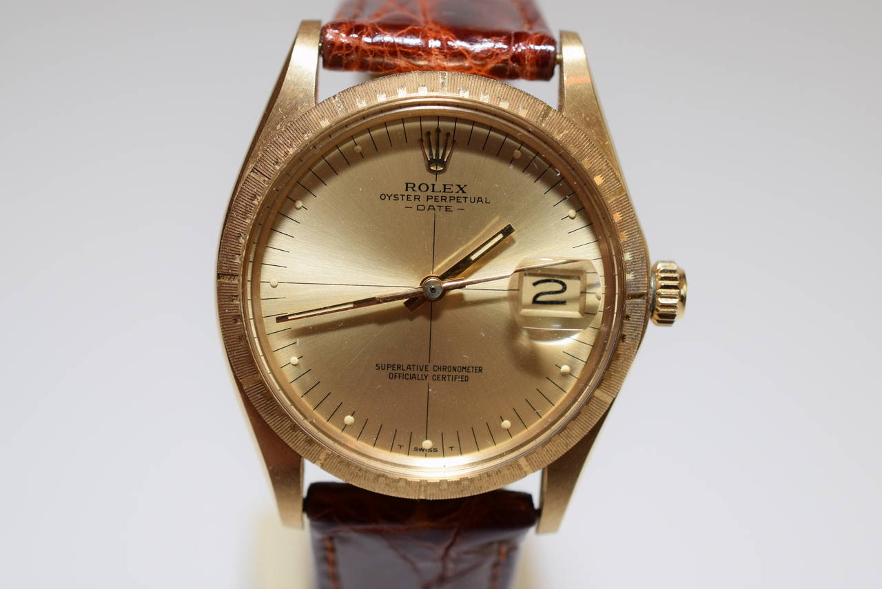 Rolex Vintage 14 K Gold Zephyr Oyster Perpetual Date .Circa :1969
Swiss Made .Automatic movement .Calibre 1570 .Reference :1512 .
Serial number 2651xxx. IN NEW OLD STOCK CONDITION !!! 34 mm case .
Very Rare in Gold !!! Comes with Original Rolex