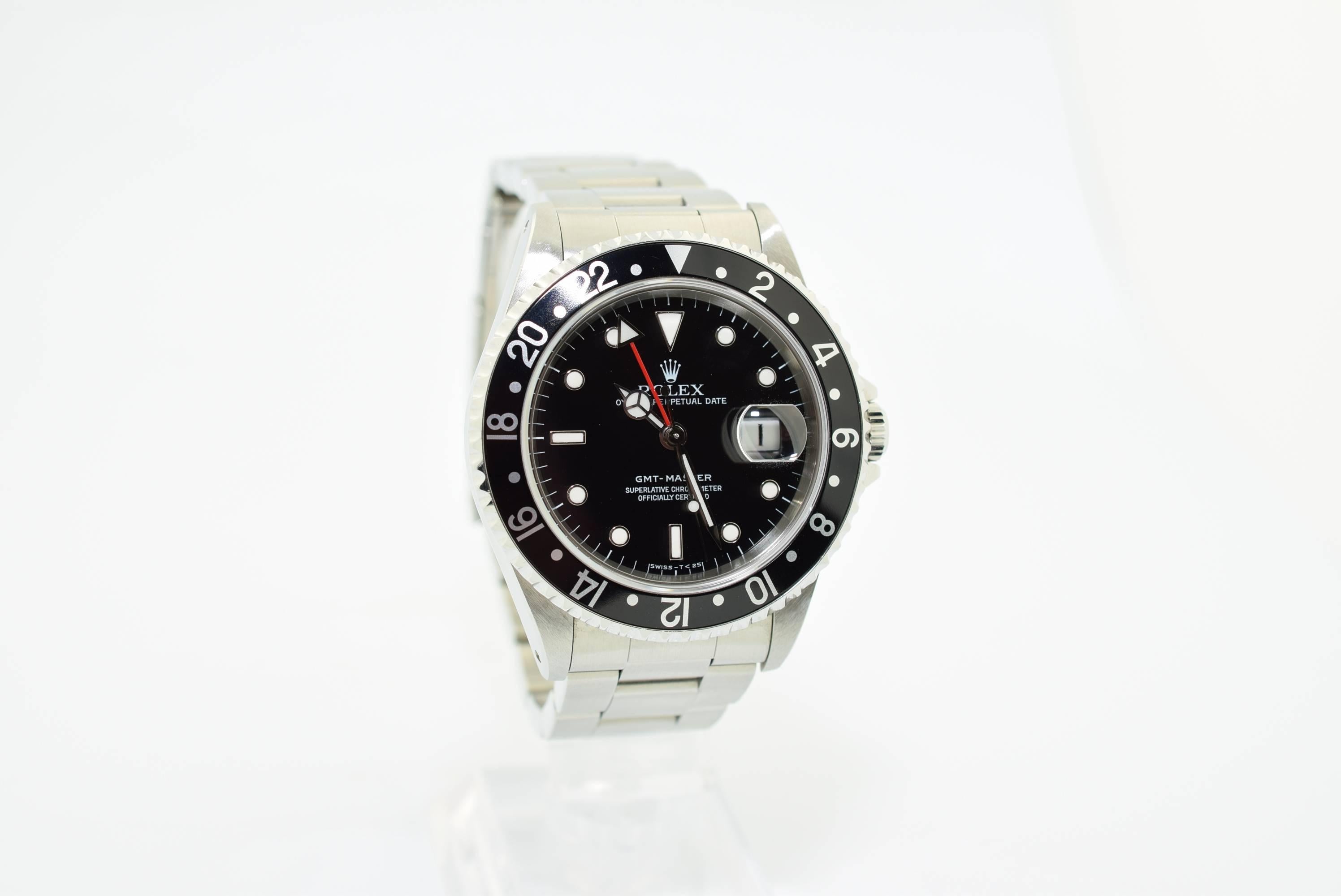 Rolex GMT Master One .Model 16700 .Stainless Steel .W seris with original papers as shown .Comes also with Rolex Box .Circa :1995 .Stainless Steel .39 mm case Diameter .Rolex safety clasp Band .Excellent condition and never out of Fashion and always