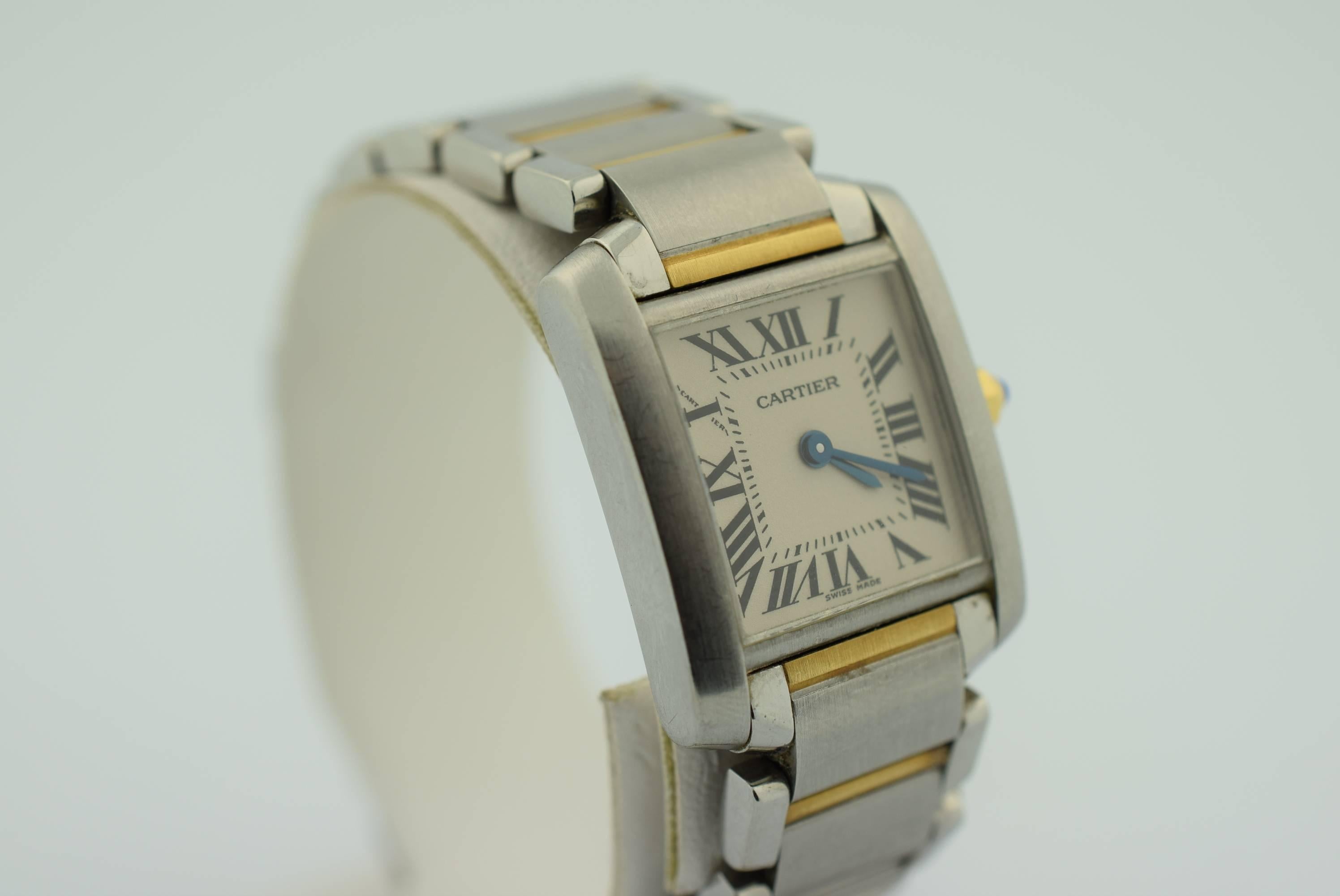 Cartier Tank Francaise Two Tone Gold .Quartz movement .Circa :2012.Swiss made .
Excellent condition .20 mm x 20 mm case dimensions.Silver dial .Roman numerals .
18 k yellow Gold & Stainless band .Saphirre Crystal .Warranted for one year from date