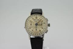 Heuer Stainless Steel Tourneau Triple Date Chronograph Wristwatch