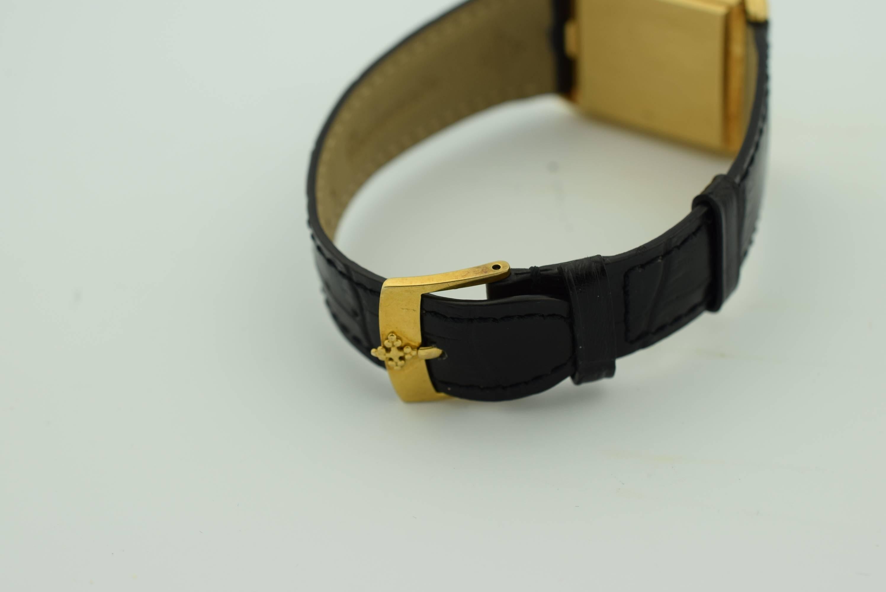 Patek Philippe 18 K Yellow gold with Black Onyx Dial .Model 3649.
Manual wind .Step down Case .36 mm x 30mm case dimensions.
Excellent condition .Rectangular .Patek Philippe Crocodile black band with 18 kyg generic buckle .Warranted for one year