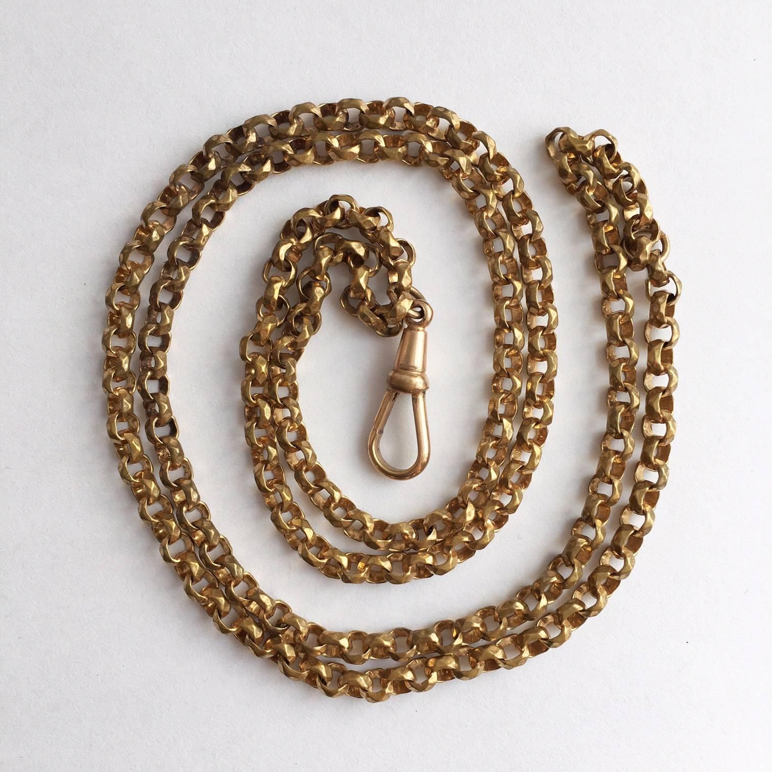 The queen of all chains, the guard chain is both stylish and incredibly useful. This is a lovely long gilt brass example with beautifully faceted links. End to end the necklace measures 72cm. It can be worn in a multitude of ways and the lobster