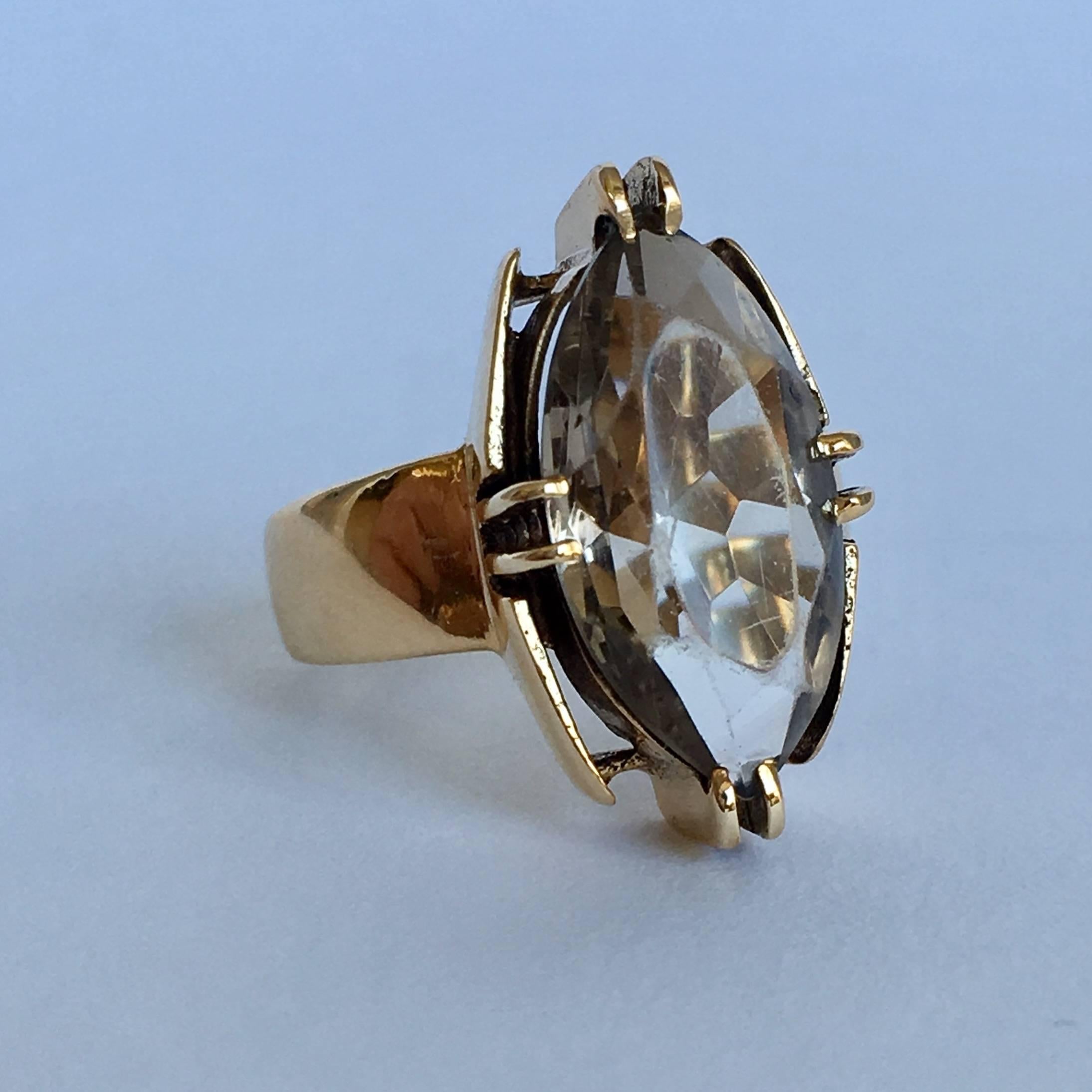 This chunky smoky quartz 9ct gold ring oozes midcentury appeal. The hallmarks tell us it was assayed in London in 1965, peak swinging sixties era. (No doubt it has some tales to tell.) From claw to claw, the ring is 2.2cm high – neat enough for