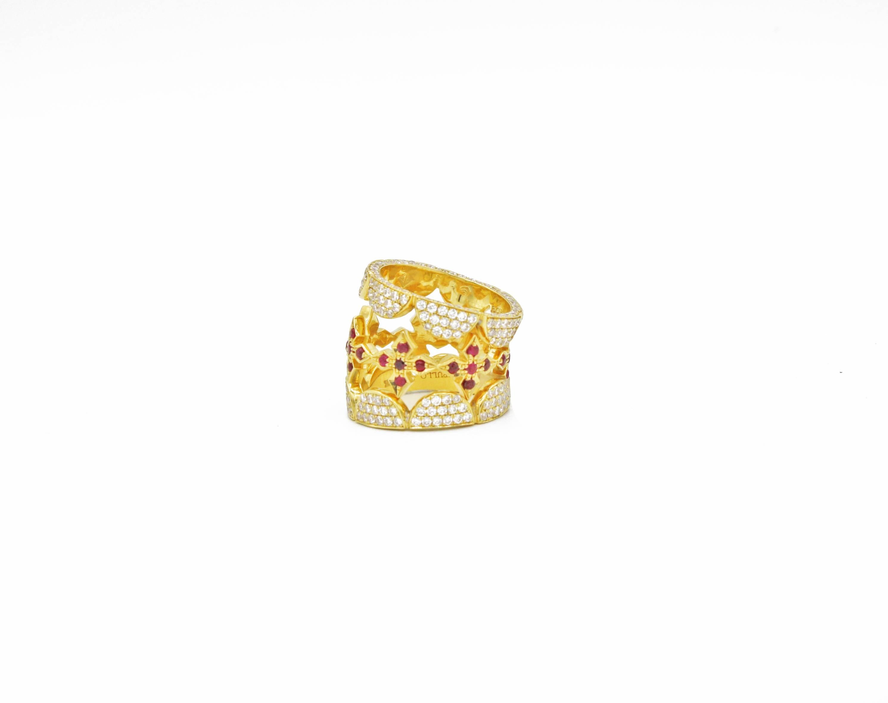 One of Renato Cipullo's latest designs, these stacking rings are comprised of 18kt yellow gold, 2.20 cts diamonds (G color, VS clarity), and 0.47 cts rubies.  This versatile set of rings can be worn individually or in a variety of