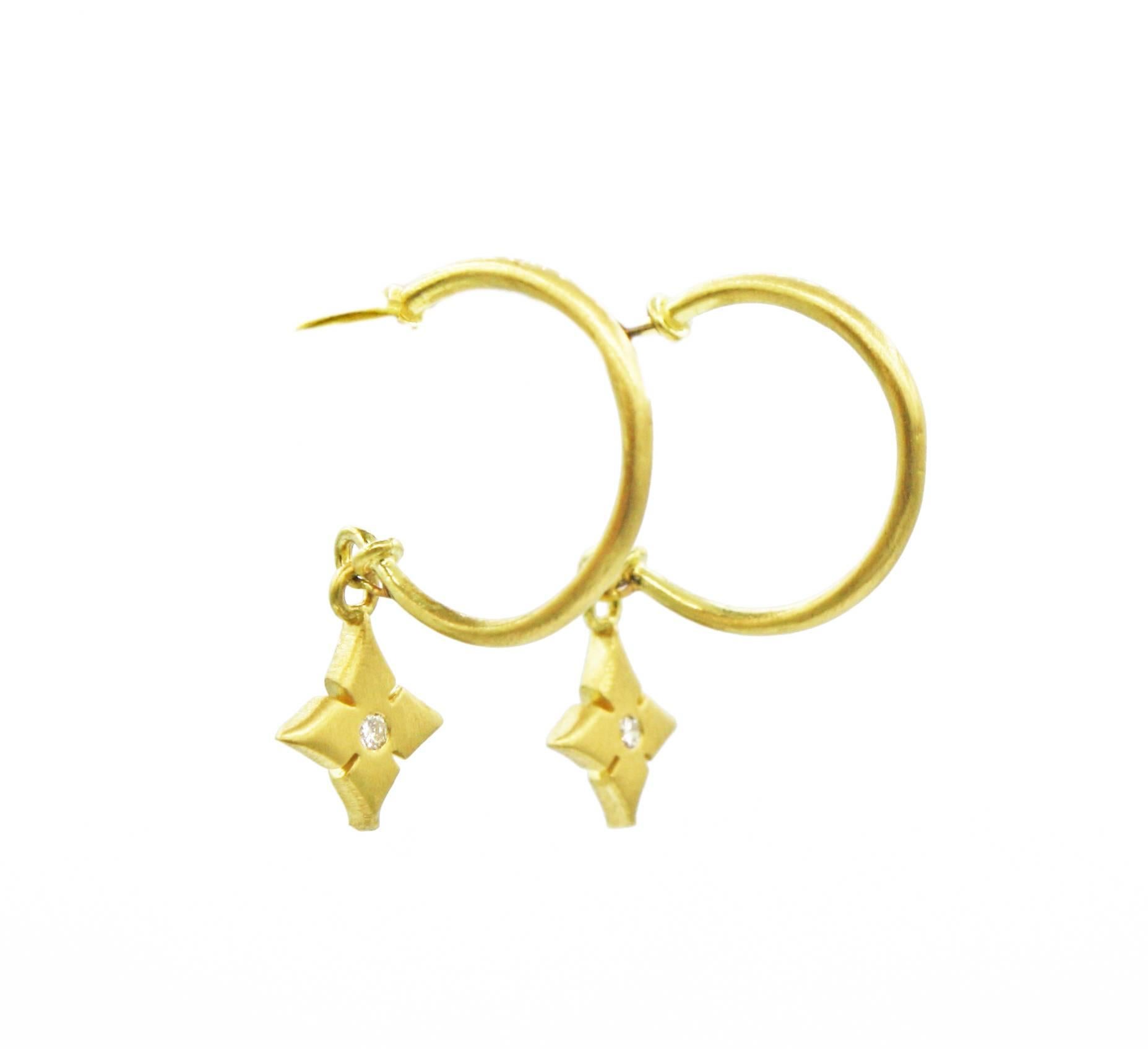 These delicate hoop earrings are from Renato Cipullo's 