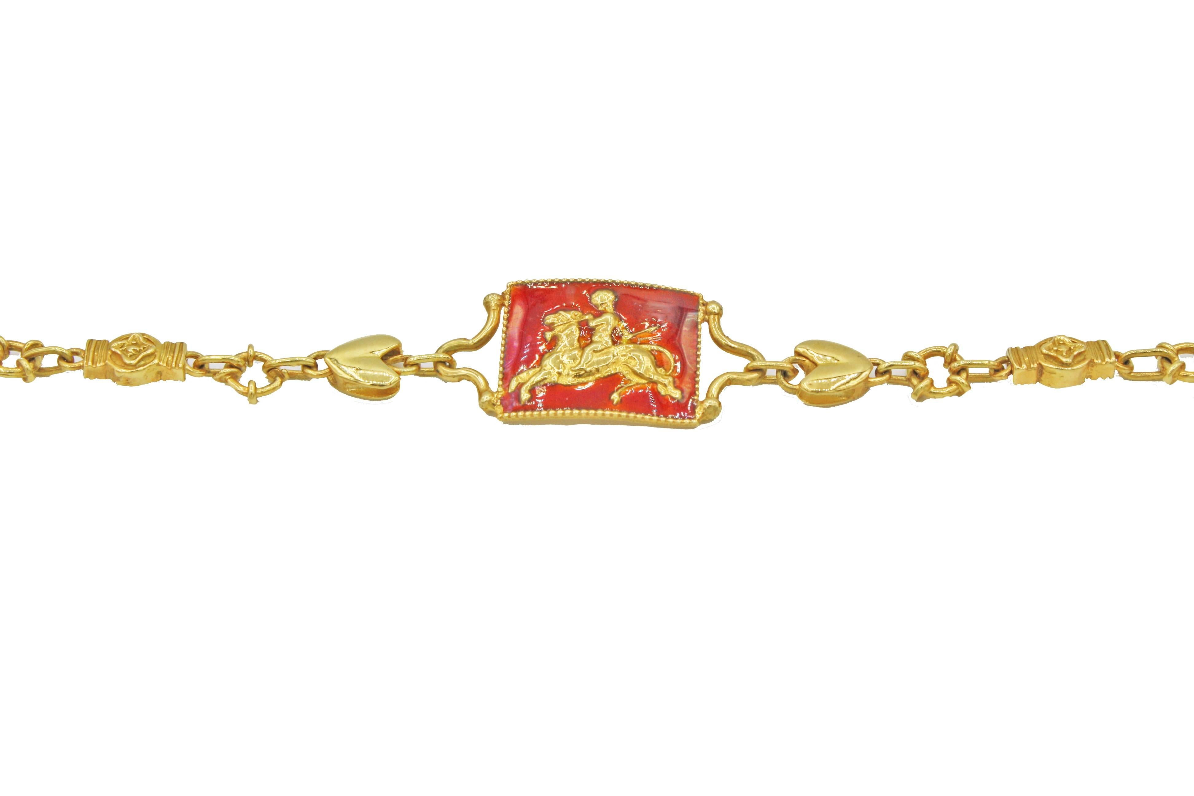 This 18 kt gold enamel bracelet is from Renato Cipullo's Romantica Collection.  This lovely bracelet has a variety of elaborate links along with a nymph and lion enamel medallion.