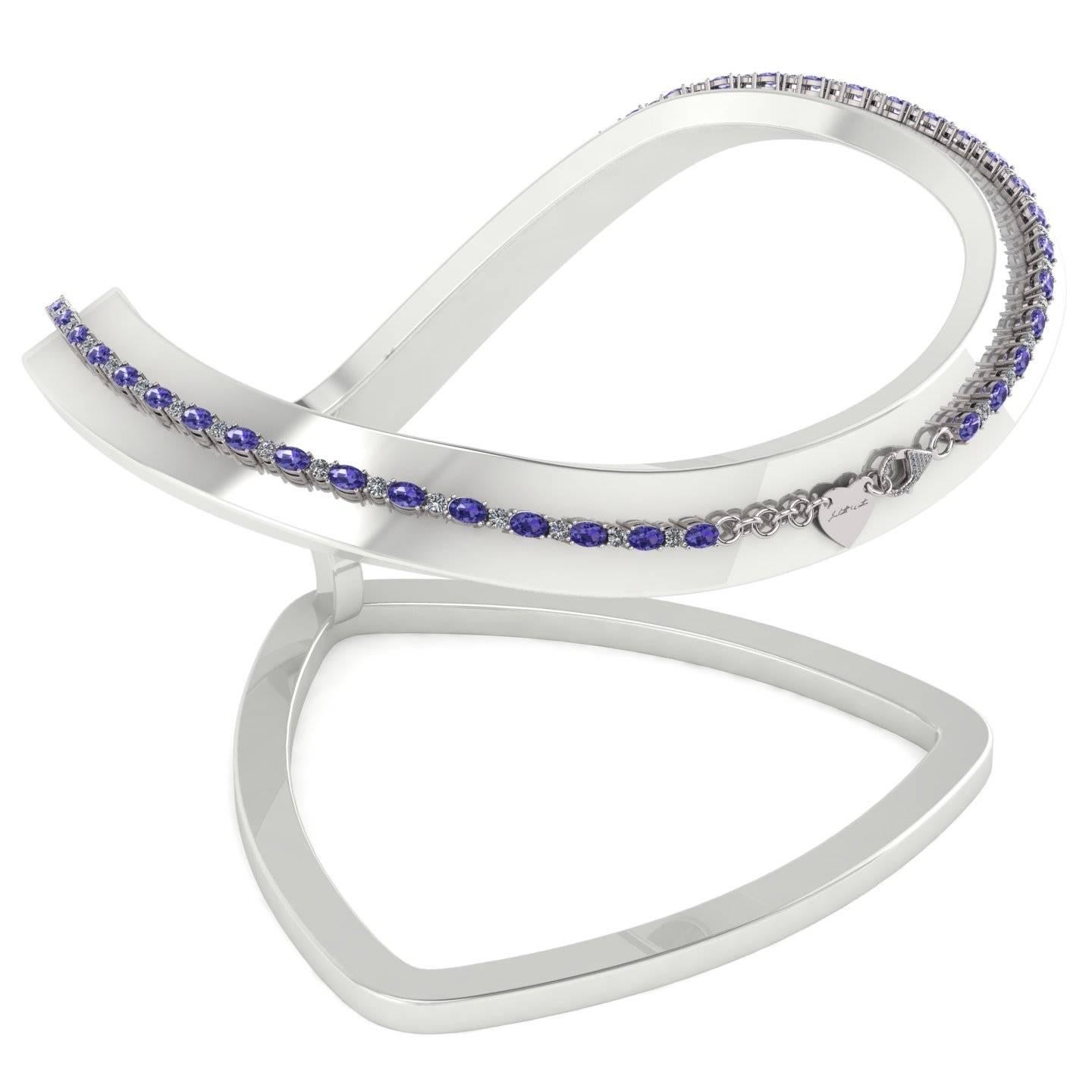 INTRODUCING OUR STUNNING TANZANITE AND DIAMOND TENNIS NECKLACE 

Beautiful and precious! Tanzanite’s gorgeous color is a captivating mix of blue and purple. It is symbolizing life, power and balance. Discover the natural beauty of this mysterious