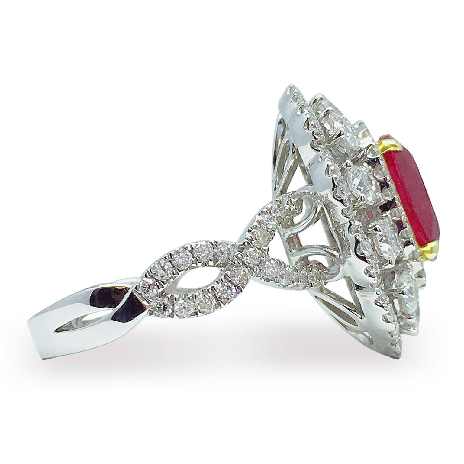 GILIN 2.15 Carat Oval cut Pigeon's Blood Burmese Ruby center stone, H(a), accompanied by 1.49 carat round brilliant diamonds. Made in 18K white gold. Ring size US 5.75 (resizable). 

GRS: 2012-030514T