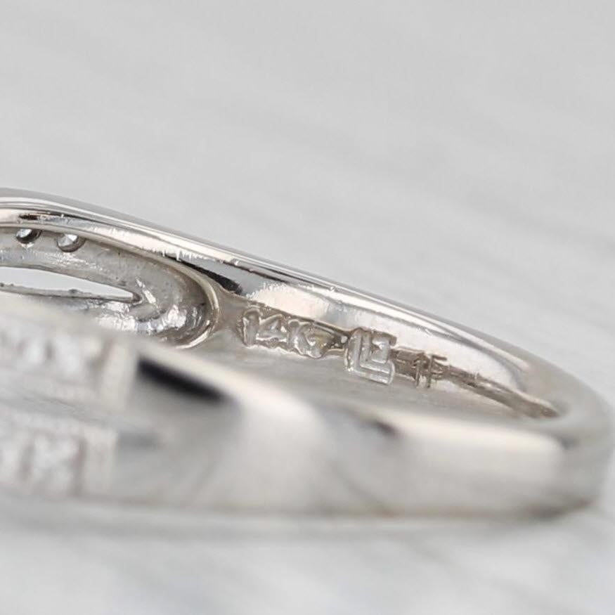 Anello di fidanzamento aureolato con diamante rotondo da 0,55 carati in oro bianco 14k, misura 6,75 in vendita 3